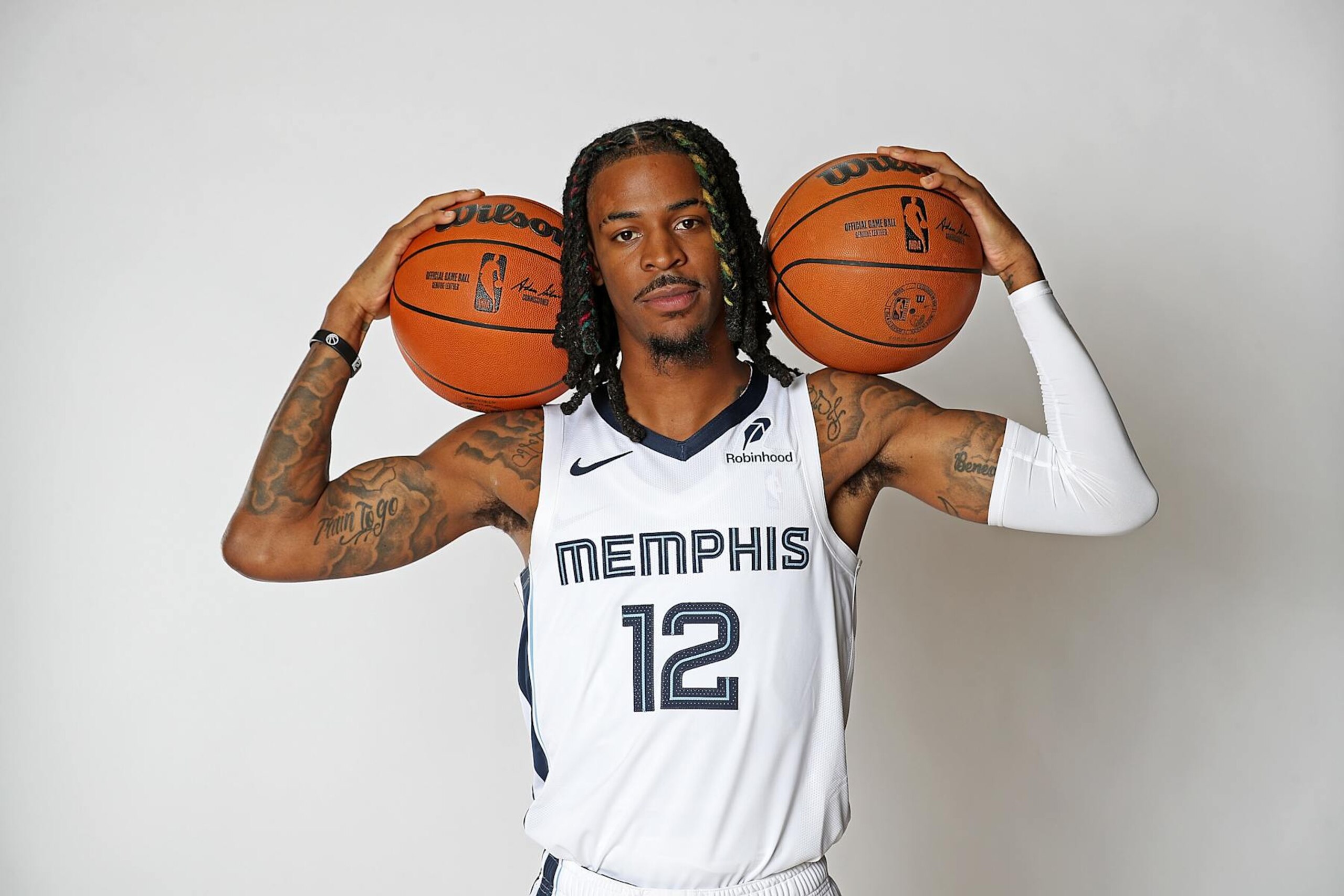 MEMPHIS, TENNESSEE - SEPTEMBER 30: Ja Morant #12 of the Memphis Grizzlies poses for a photo during media day at FedExForum on September 30, 2024 in Memphis, Tennessee. NOTE TO USER: User expressly acknowledges and agrees that, by downloading and or using this photograph, User is consenting to the terms and conditions of the Getty Images License Agreement. (Photo by Justin Ford/Getty Images)