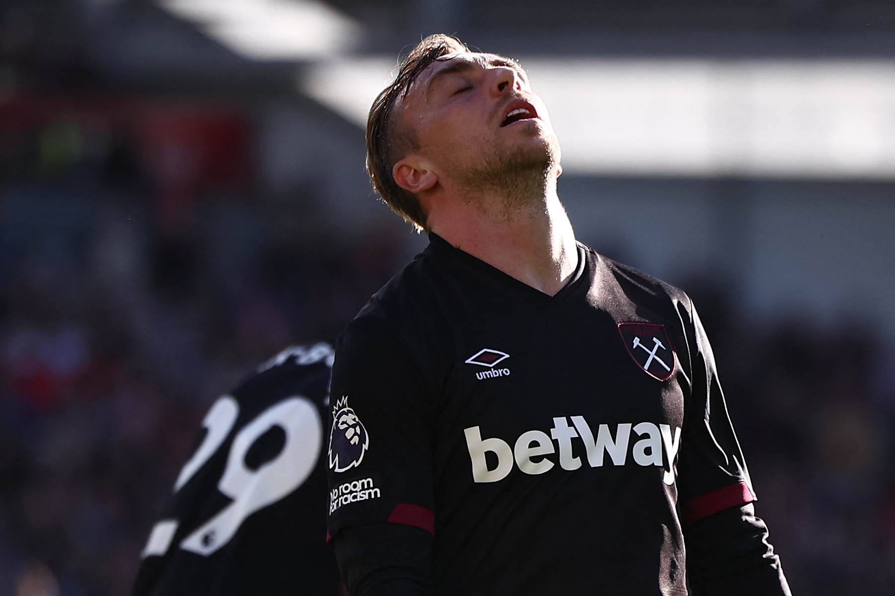 West Ham United's English striker #20 Jarrod Bowen reacts after failing to score during the English Premier League football match between Brentford and West Ham United at the Gtech Community Stadium in London on September 28, 2024. (Photo by HENRY NICHOLLS / AFP) / RESTRICTED TO EDITORIAL USE. No use with unauthorized audio, video, data, fixture lists, club/league logos or 'live' services. Online in-match use limited to 120 images. An additional 40 images may be used in extra time. No video emulation. Social media in-match use limited to 120 images. An additional 40 images may be used in extra time. No use in betting publications, games or single club/league/player publications. /  (Photo by HENRY NICHOLLS/AFP via Getty Images)