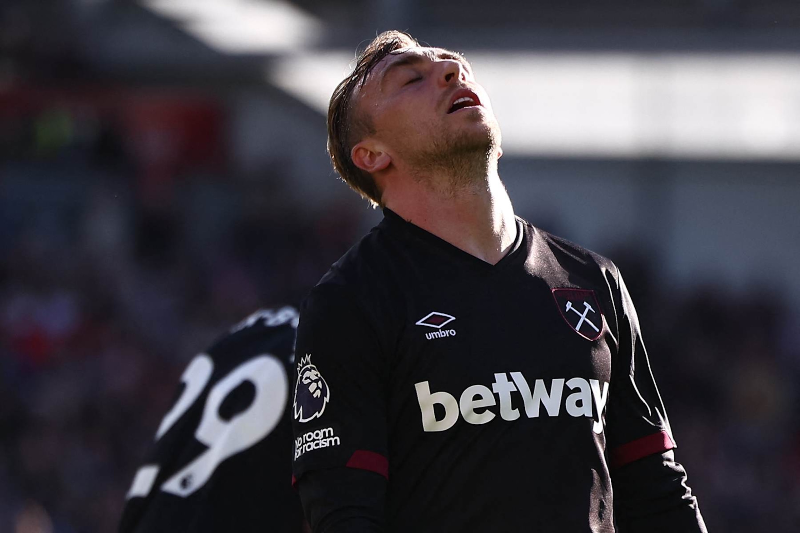 West Ham United's English striker #20 Jarrod Bowen reacts after failing to score during the English Premier League football match between Brentford and West Ham United at the Gtech Community Stadium in London on September 28, 2024. (Photo by HENRY NICHOLLS / AFP) / RESTRICTED TO EDITORIAL USE. No use with unauthorized audio, video, data, fixture lists, club/league logos or 'live' services. Online in-match use limited to 120 images. An additional 40 images may be used in extra time. No video emulation. Social media in-match use limited to 120 images. An additional 40 images may be used in extra time. No use in betting publications, games or single club/league/player publications. /  (Photo by HENRY NICHOLLS/AFP via Getty Images)