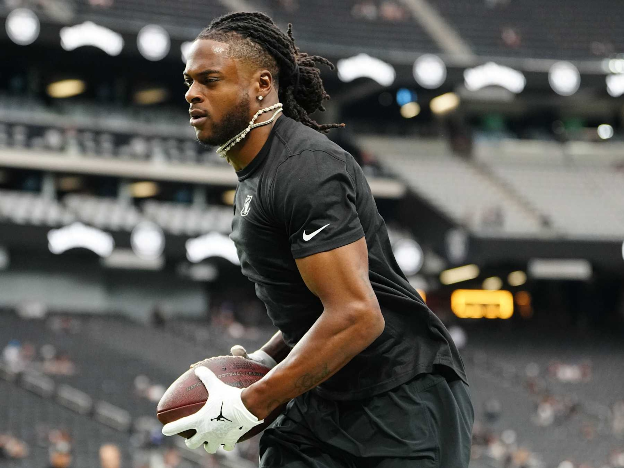 LAS VEGAS, NEVADA - SEPTEMBER 22: Davante Adams #17 of the Las Vegas Raiders warms up before the game against the Carolina Panthers at Allegiant Stadium on September 22, 2024 in Las Vegas, Nevada. (Photo by Louis Grasse/Getty Images)