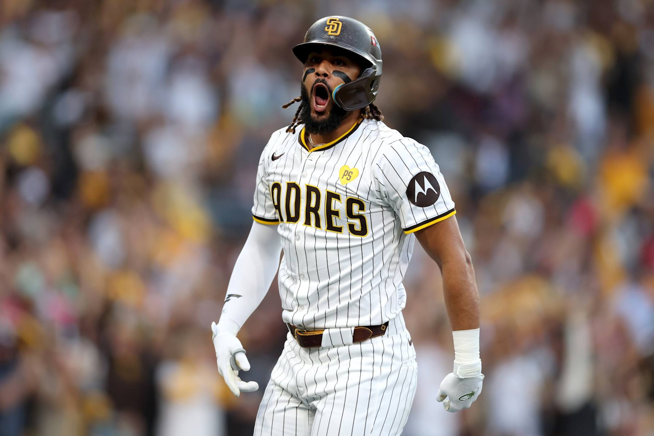 SAN DIEGO, CALIFORNIA - OCTOBER 01: Fernando Tatis Jr. #23 of the San Diego Padres celebrates after hitting a two run home run against AJ Smith-Shawver #32 of the Atlanta Braves during the first inning in Game One of the Wild Card Series at Petco Park on October 01, 2024 in San Diego, California. (Photo by Sean M. Haffey/Getty Images) SAN DIEGO, CALIFORNIA - OCTOBER 01: Fernando Tatis Jr. #23 of the San Diego Padres celebrates after hitting a two run home run against AJ Smith-Shawver #32 of the Atlanta Braves during the first inning in Game One of the Wild Card Series at Petco Park on October 01, 2024 in San Diego, California. (Photo by Sean M. Haffey/Getty Images)