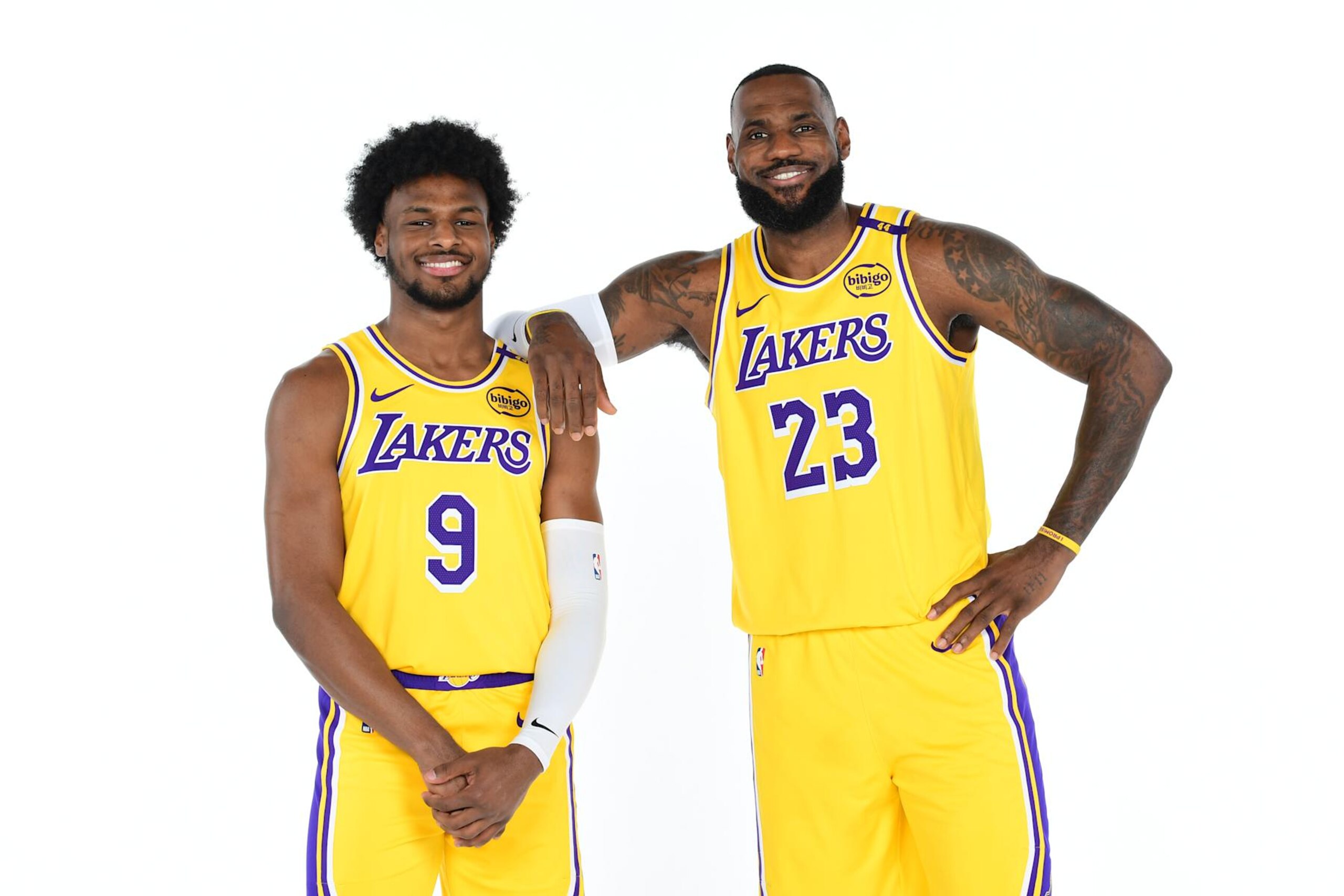 EL SEGUNDO, CA - SEPTEMBER 30: Bronny James #9 and LeBron James #23 of the Los Angeles Lakers pose for a portrait during NBA Media Day on September 30, 2024 at UCLA Health Training Center in El Segundo, California. NOTE TO USER: User expressly acknowledges and agrees that, by downloading and or using this photograph, User is consenting to the terms and conditions of the Getty Images License Agreement. Mandatory Copyright Notice: Copyright 2024 NBAE (Photo by Adam Pantozzi/NBAE via Getty Images) EL SEGUNDO, CA - SEPTEMBER 30: Bronny James #9 and LeBron James #23 of the Los Angeles Lakers pose for a portrait during NBA Media Day on September 30, 2024 at UCLA Health Training Center in El Segundo, California. NOTE TO USER: User expressly acknowledges and agrees that, by downloading and or using this photograph, User is consenting to the terms and conditions of the Getty Images License Agreement. Mandatory Copyright Notice: Copyright 2024 NBAE (Photo by Adam Pantozzi/NBAE via Getty Images)