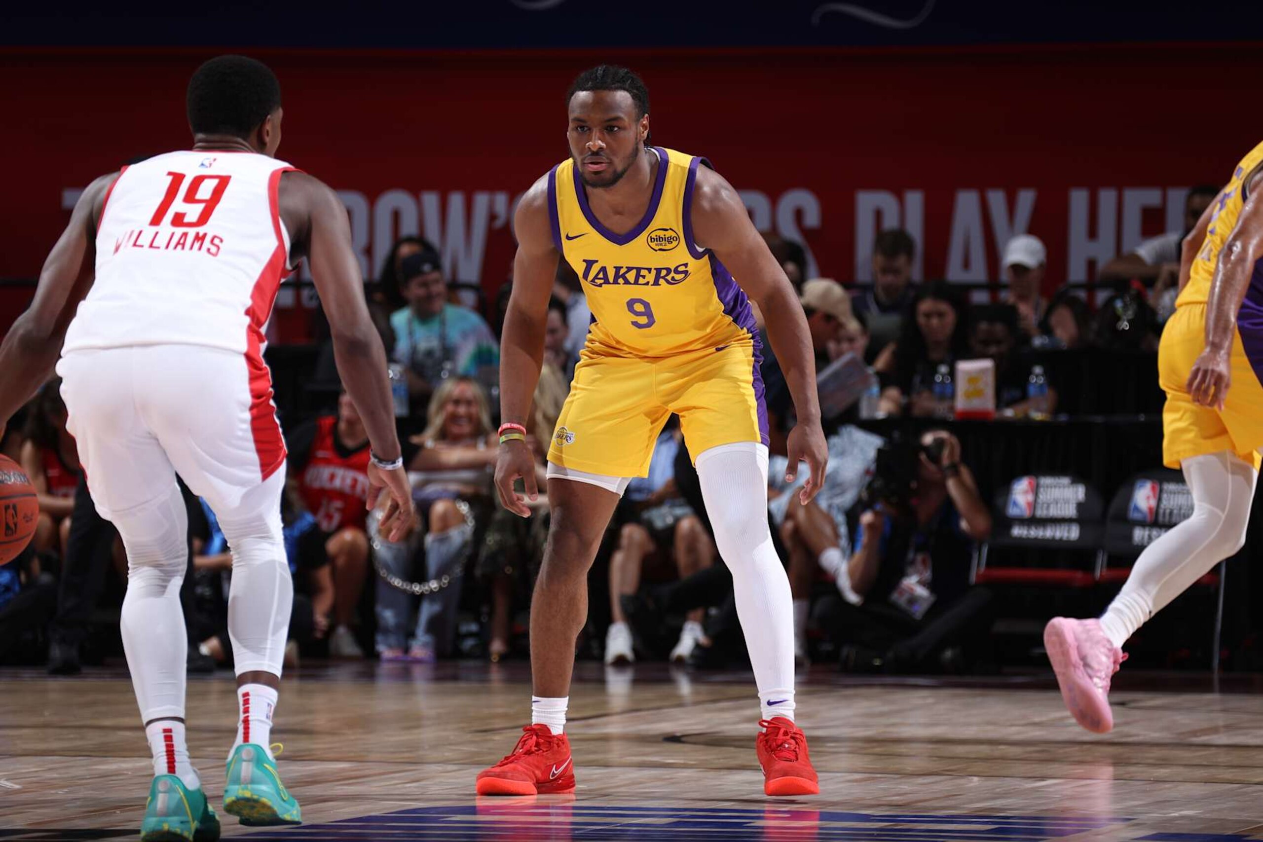LAS VEGAS, NV - JULY 12: Bronny James Jr. #9 of the Los Angeles Lakers plays defense against the Houston Rockets on July 12, 2024 at the Thomas & Mack Center in Las Vegas, Nevada. NOTE TO USER: User expressly acknowledges and agrees that, by downloading and or using this photograph, User is consenting to the terms and conditions of the Getty Images License Agreement. Mandatory Copyright Notice: Copyright 2024 NBAE (Photo by Stephen Gosling/NBAE via Getty Images) LAS VEGAS, NV - JULY 12: Bronny James Jr. #9 of the Los Angeles Lakers plays defense against the Houston Rockets on July 12, 2024 at the Thomas & Mack Center in Las Vegas, Nevada. NOTE TO USER: User expressly acknowledges and agrees that, by downloading and or using this photograph, User is consenting to the terms and conditions of the Getty Images License Agreement. Mandatory Copyright Notice: Copyright 2024 NBAE (Photo by Stephen Gosling/NBAE via Getty Images)