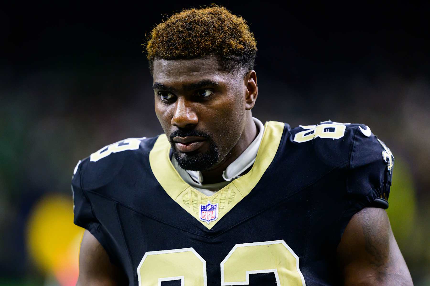 NEW ORLEANS, LOUISIANA - SEPTEMBER 22: Juwan Johnson #83 of the New Orleans Saints looks on against the Philadelphia Eagles at Caesars Superdome on September 22, 2024 in New Orleans, Louisiana. (Photo by Gus Stark/Getty Images)