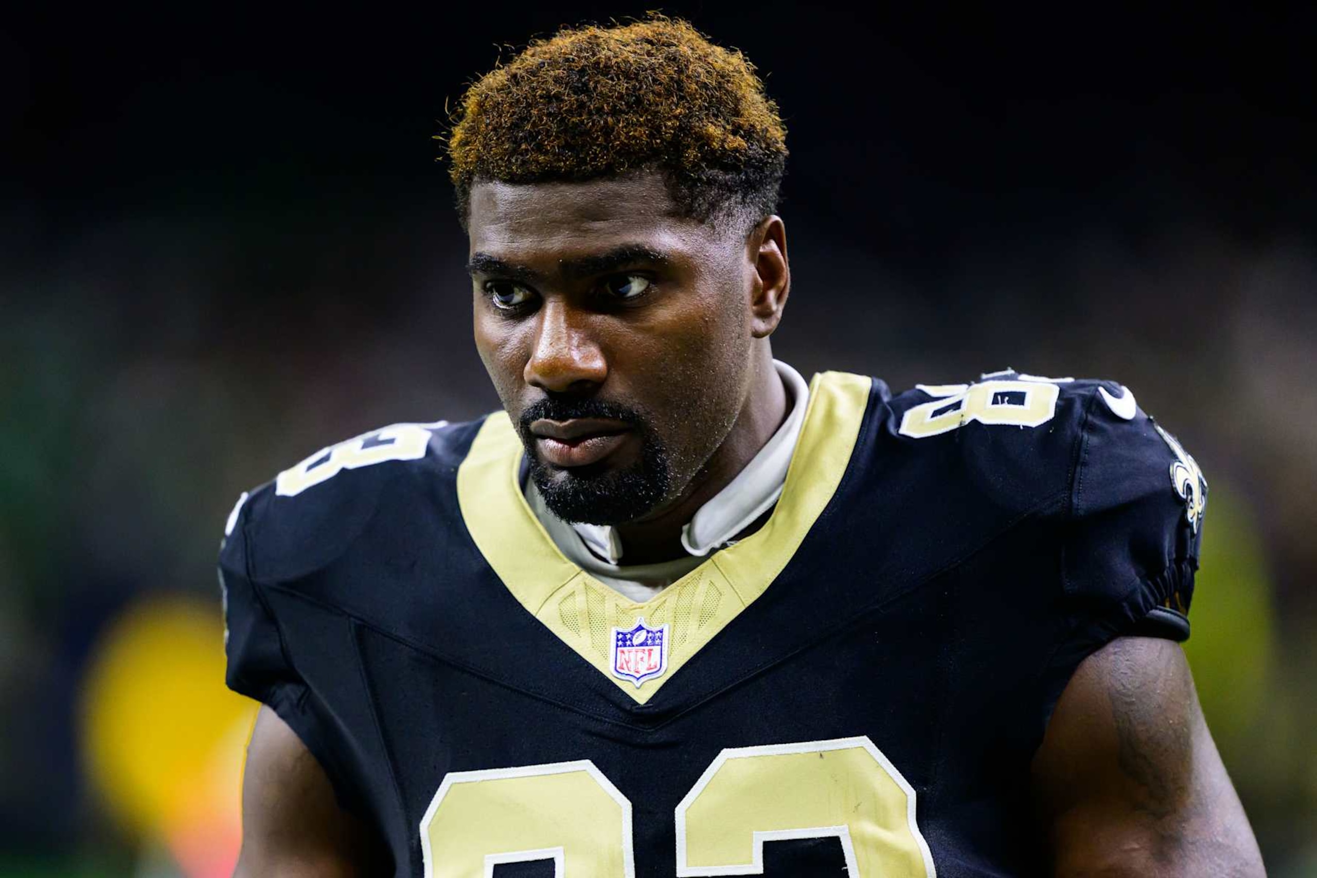 NEW ORLEANS, LOUISIANA - SEPTEMBER 22: Juwan Johnson #83 of the New Orleans Saints looks on against the Philadelphia Eagles at Caesars Superdome on September 22, 2024 in New Orleans, Louisiana. (Photo by Gus Stark/Getty Images)