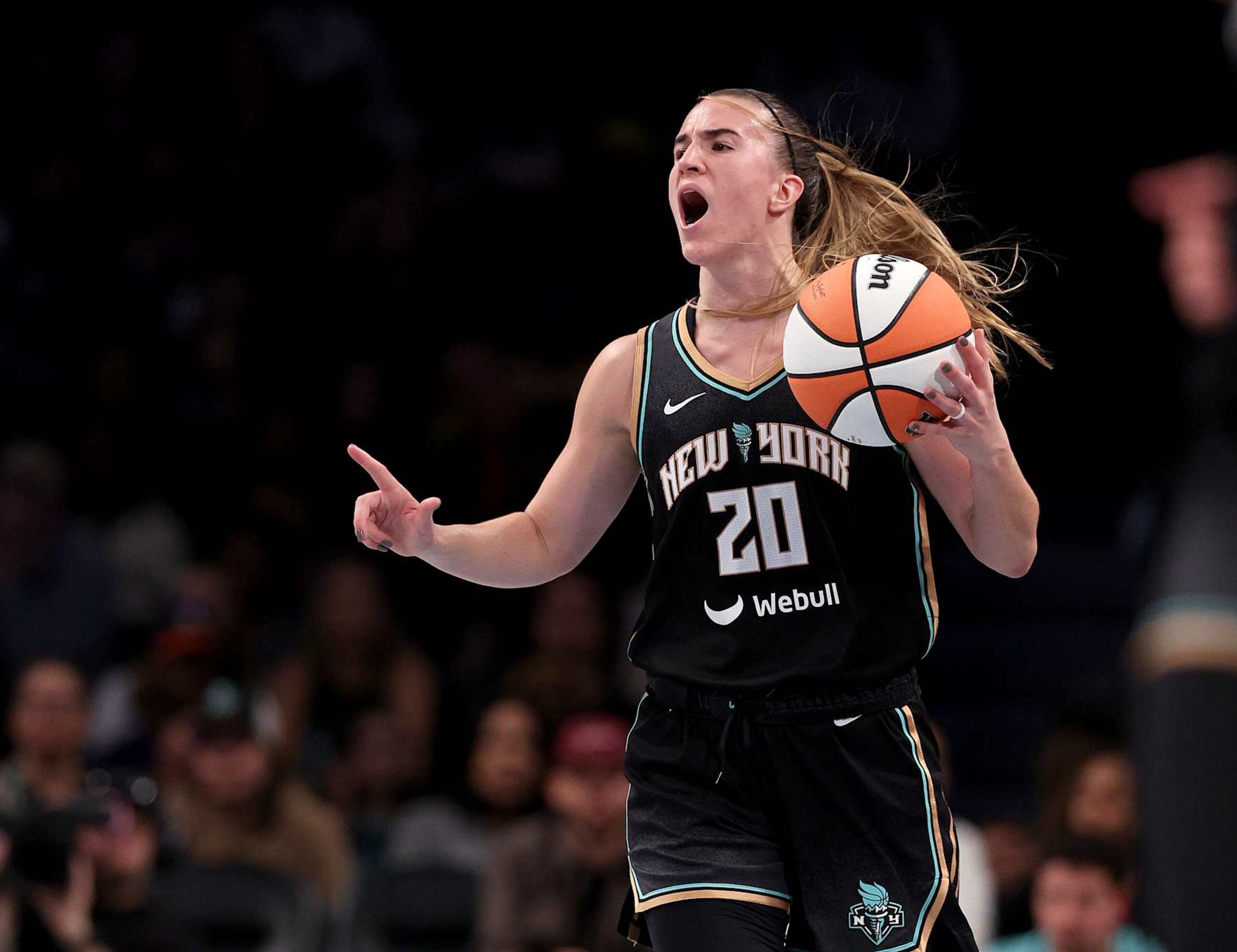 NEW YORK, NEW YORK - OCTOBER 01: Sabrina Ionescu #20 of the New York Liberty directs her teammates in the second half of Game Two of the WNBA Semifinals against the Las Vegas Aces at Barclays Center on October 01, 2024 in New York City. The New York Liberty defeated the Las Vegas Aces 88-84. NOTE TO USER: User expressly acknowledges and agrees that, by downloading and or using this photograph, User is consenting to the terms and conditions of the Getty Images License Agreement. (Photo by Elsa/Getty Images)