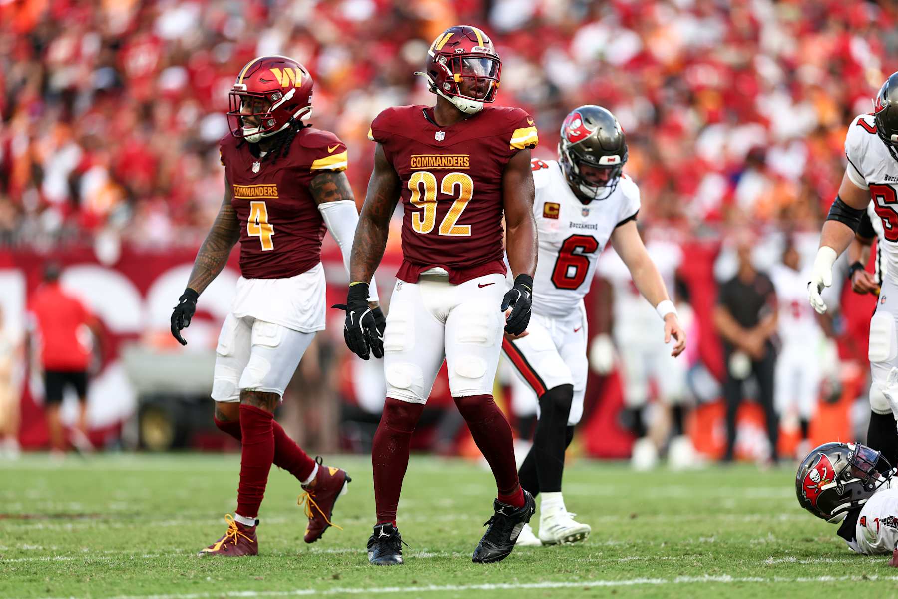 TAMPA, FL - SEPTEMBER 8: Dorance Armstrong #92 of the Washington Commanders reacts after a play during an NFL football game against the Tampa Bay Buccaneers at Raymond James Stadium on September 8, 2024 in Tampa, Florida. (Photo by Kevin Sabitus/Getty Images)