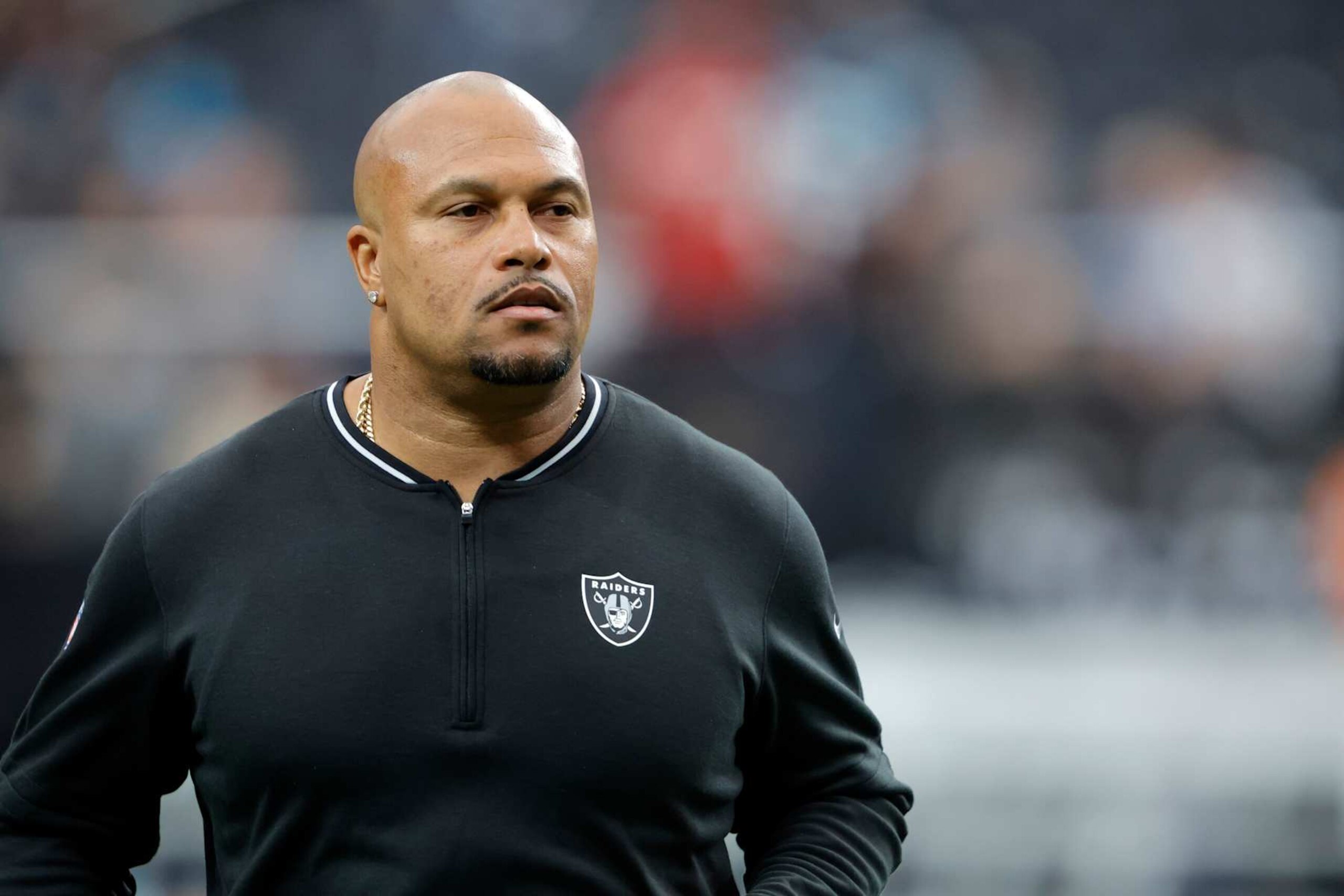 LAS VEGAS, NEVADA - SEPTEMBER 22: Las Raiders head coach Antonio Pierce watches players warm up before the start of a game against the Carolina Panthers at Allegiant Stadium on September 22, 2024 in Las Vegas, Nevada. (Photo by Steve Marcus/Getty Images) LAS VEGAS, NEVADA - SEPTEMBER 22: Las Raiders head coach Antonio Pierce watches players warm up before the start of a game against the Carolina Panthers at Allegiant Stadium on September 22, 2024 in Las Vegas, Nevada. (Photo by Steve Marcus/Getty Images)