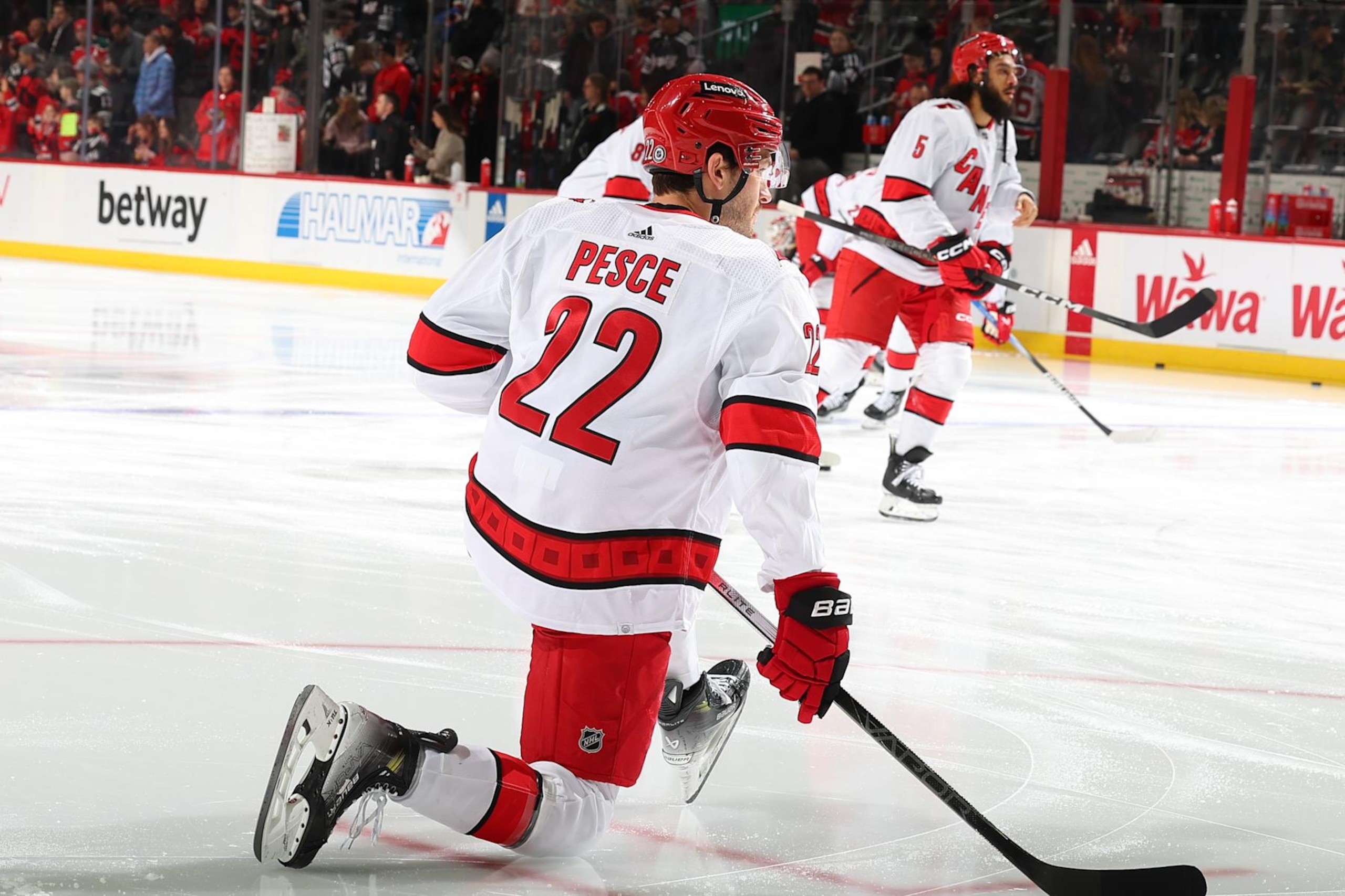 NEWARK, NJ - MARCH 09: Brett Pesce #22 of the Carolina Hurricanes warms up prior to the game against the New Jersey Devils at the Prudential Center on March 9, 2024 in Newark, New Jersey.  (Photo by Rich Graessle/NHLI via Getty Images)