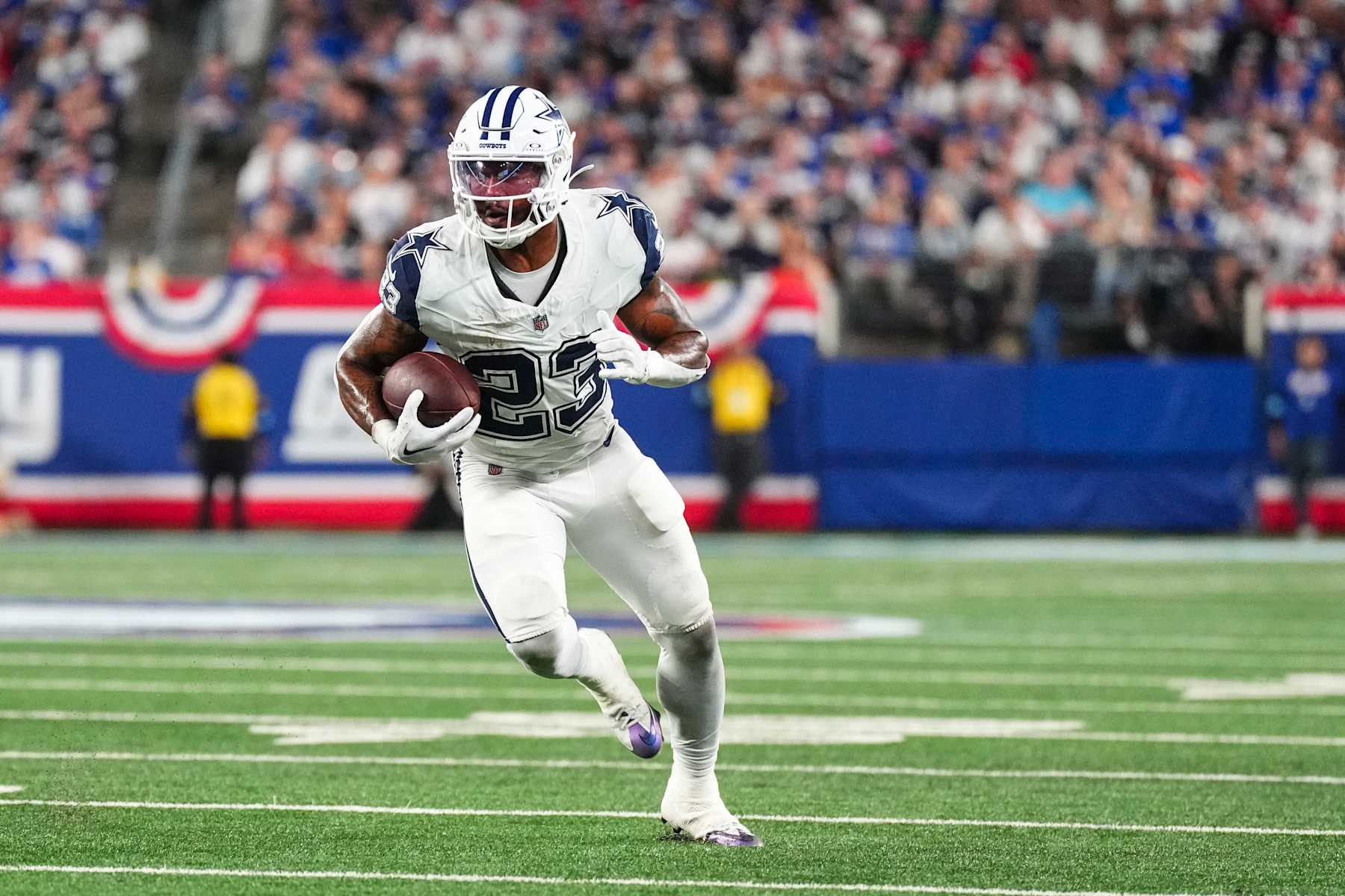 EAST RUTHERFORD, NJ - SEPTEMBER 26: Rico Dowdle #23 of the Dallas Cowboys runs the ball during an NFL football game against the New York Giants at MetLife Stadium on September 26, 2024 in East Rutherford, New Jersey. (Photo by Cooper Neill/Getty Images)