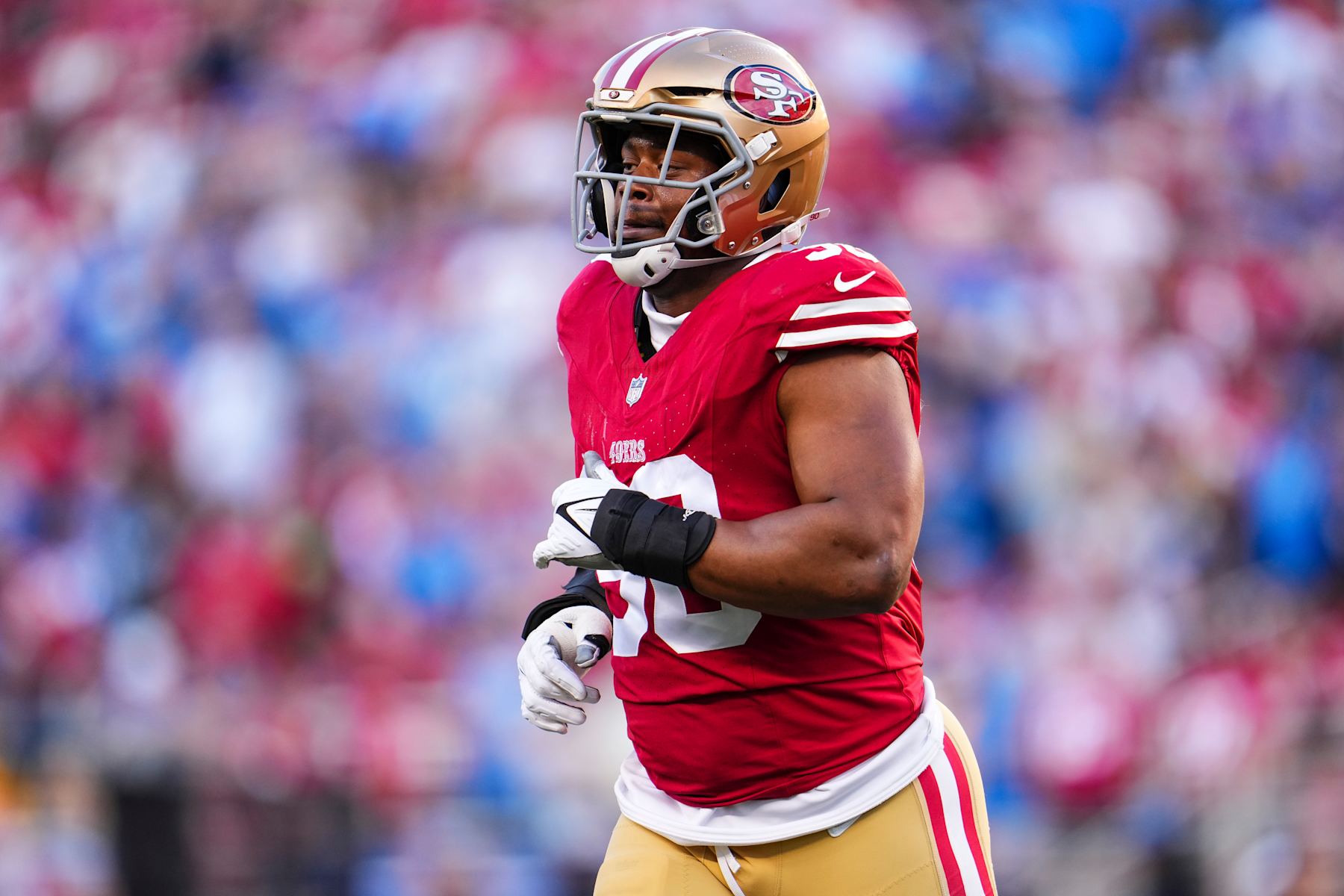 SANTA CLARA, CA - JANUARY 28: Kevin Givens #90 of the San Francisco 49ers looks on from the field during the NFC Championship NFL football game against the Detroit Lions at Levi's Stadium on January 28, 2024 in Santa Clara, California. (Photo by Cooper Neill/Getty Images)