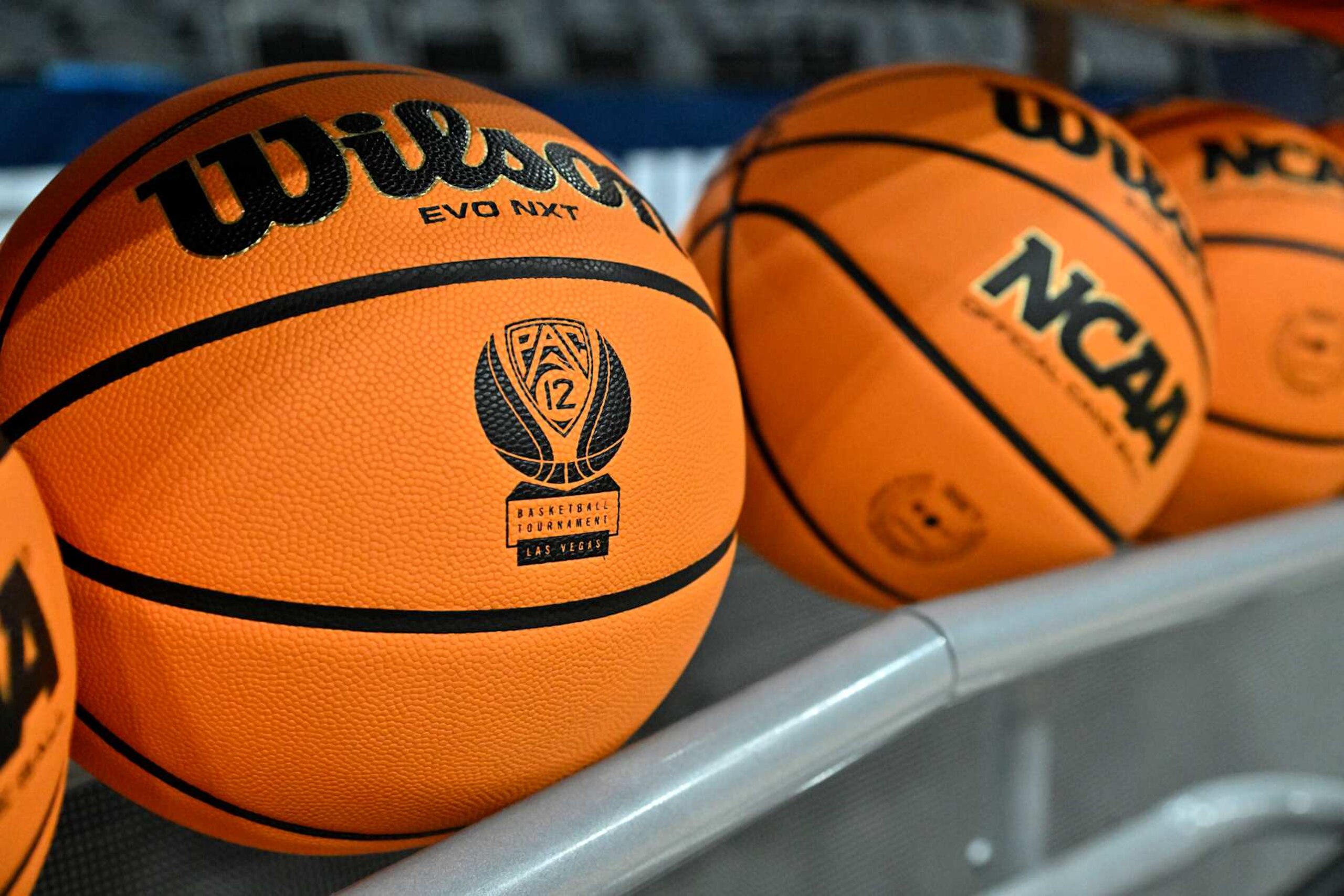 LAS VEGAS, NEVADA - MARCH 15: A Pac-12 basketball tournament logo is shown on basketballs before a semifinal game between the Arizona Wildcats and the Oregon Ducks in the Pac-12 Conference basketball tournament at T-Mobile Arena on March 15, 2024 in Las Vegas, Nevada. (Photo by David Becker/Getty Images) LAS VEGAS, NEVADA - MARCH 15: A Pac-12 basketball tournament logo is shown on basketballs before a semifinal game between the Arizona Wildcats and the Oregon Ducks in the Pac-12 Conference basketball tournament at T-Mobile Arena on March 15, 2024 in Las Vegas, Nevada. (Photo by David Becker/Getty Images)