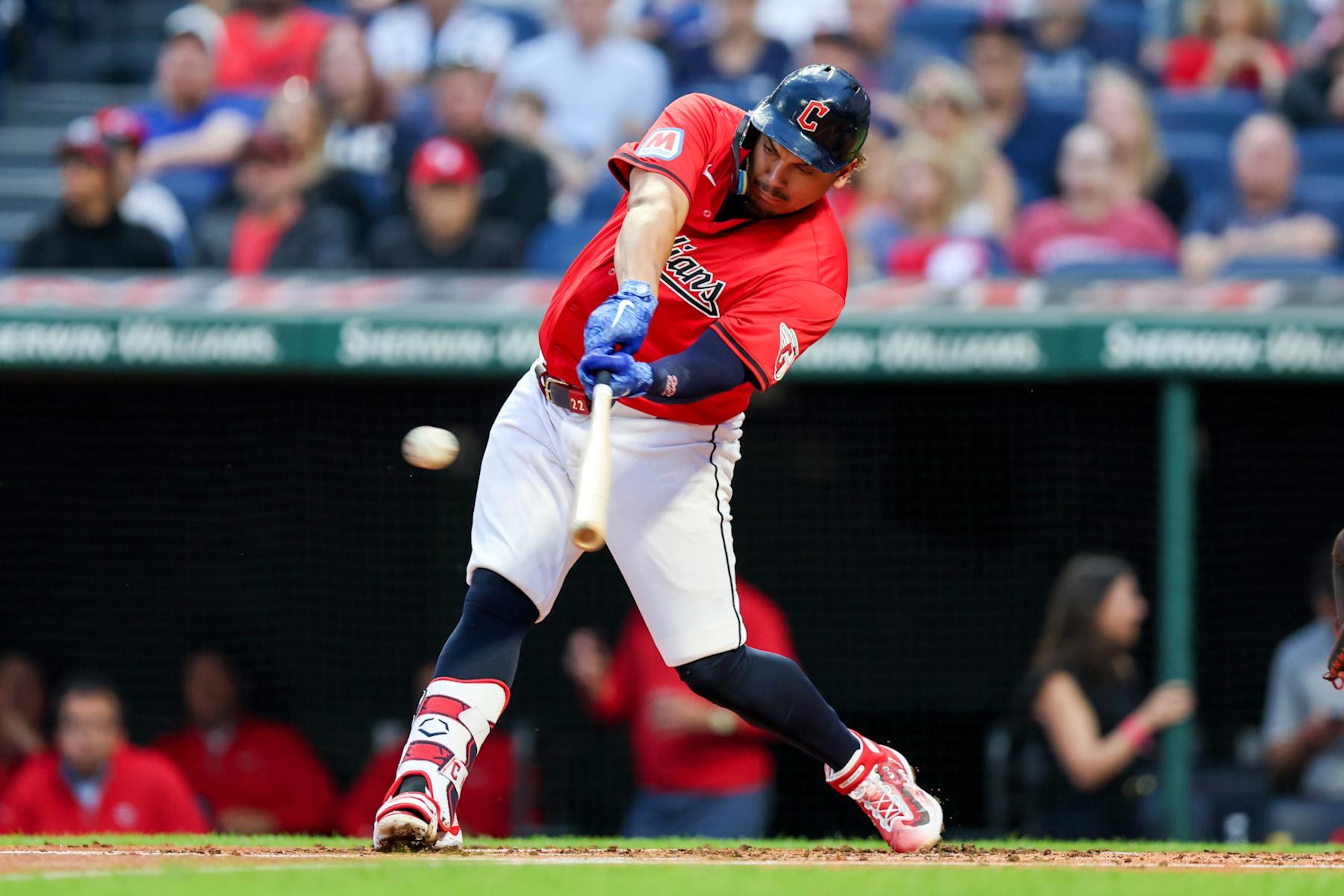 CLEVELAND, OH - SEPTEMBER 24: Cleveland Guardians first baseman Josh Naylor (22) singles to right during the first inning of the Major League Baseball Interleague game between the Cincinnati Reds and Cleveland Guardians on September 24, 2024, at Progressive Field in Cleveland, OH. (Photo by Frank Jansky/Icon Sportswire via Getty Images)