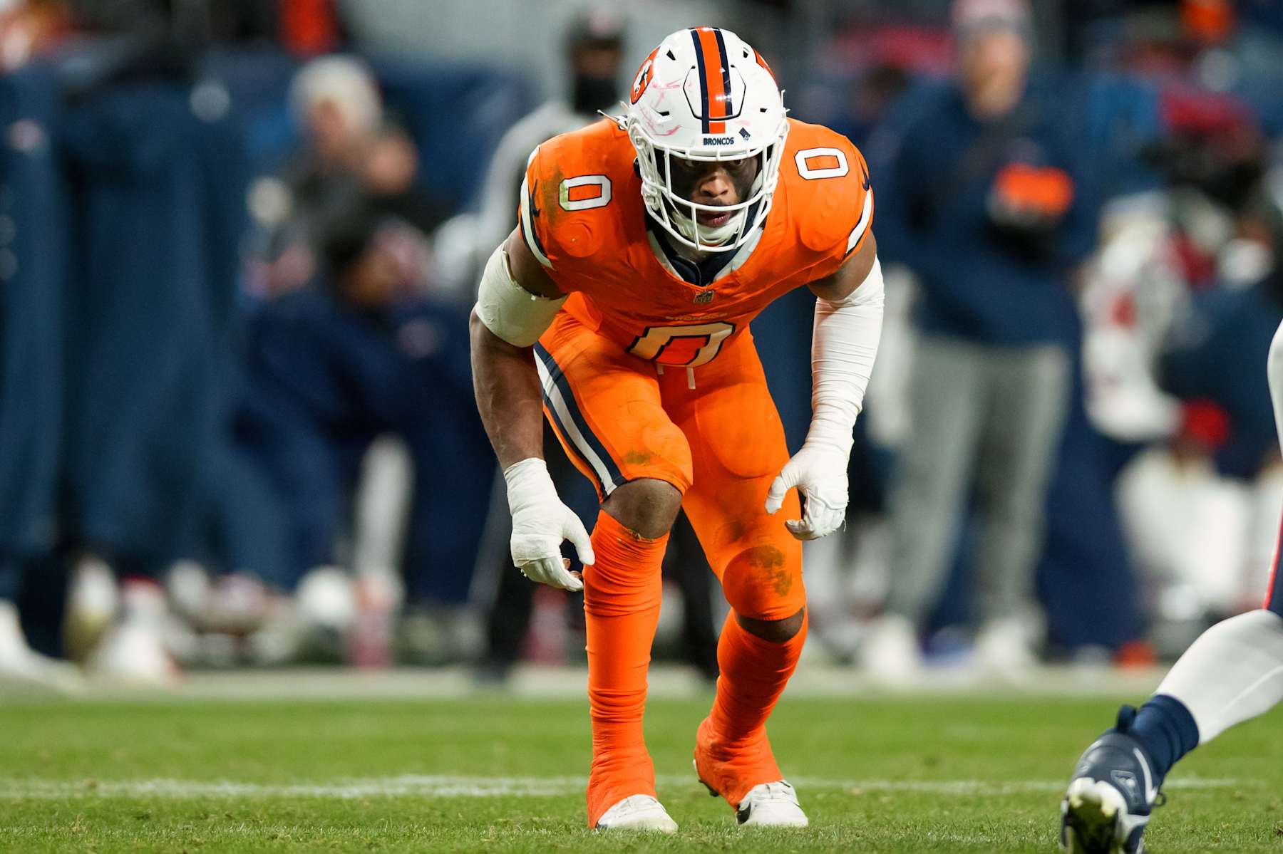 DENVER, CO - JANUARY 24:  Linebacker Jonathon Cooper #0 of the Denver Broncos lines up during the fourth quarter against the New England Patriots at Empower Field at Mile High on December 24, 2023 in Denver, Colorado. (Photo by Justin Edmonds/Getty Images)