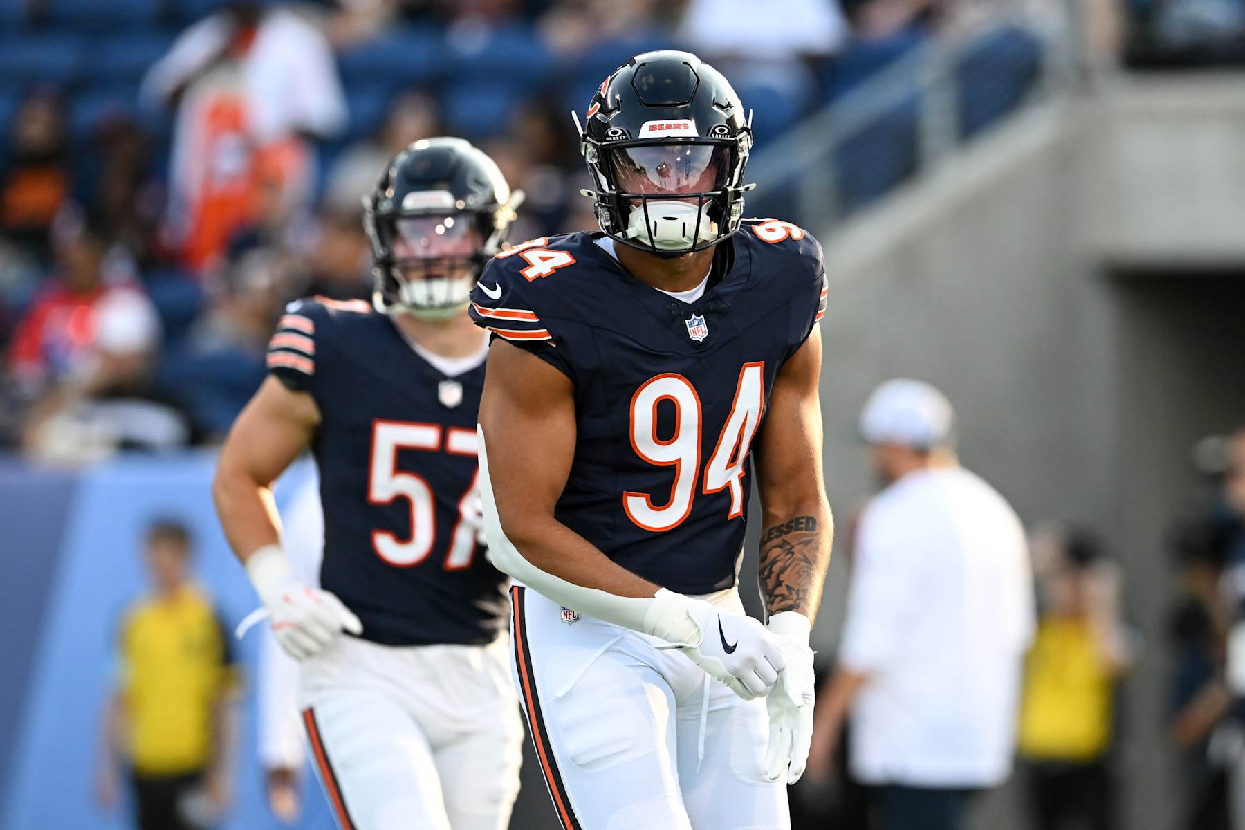 CANTON, OHIO - AUGUST 01: Austin Booker #94 of the Chicago Bears warms up prior to the 2024 Pro Football Hall of Fame Game against the Houston Texans at Tom Benson Hall Of Fame Stadium on August 01, 2024 in Canton, Ohio. (Photo by Nick Cammett/Diamond Images via Getty Images)