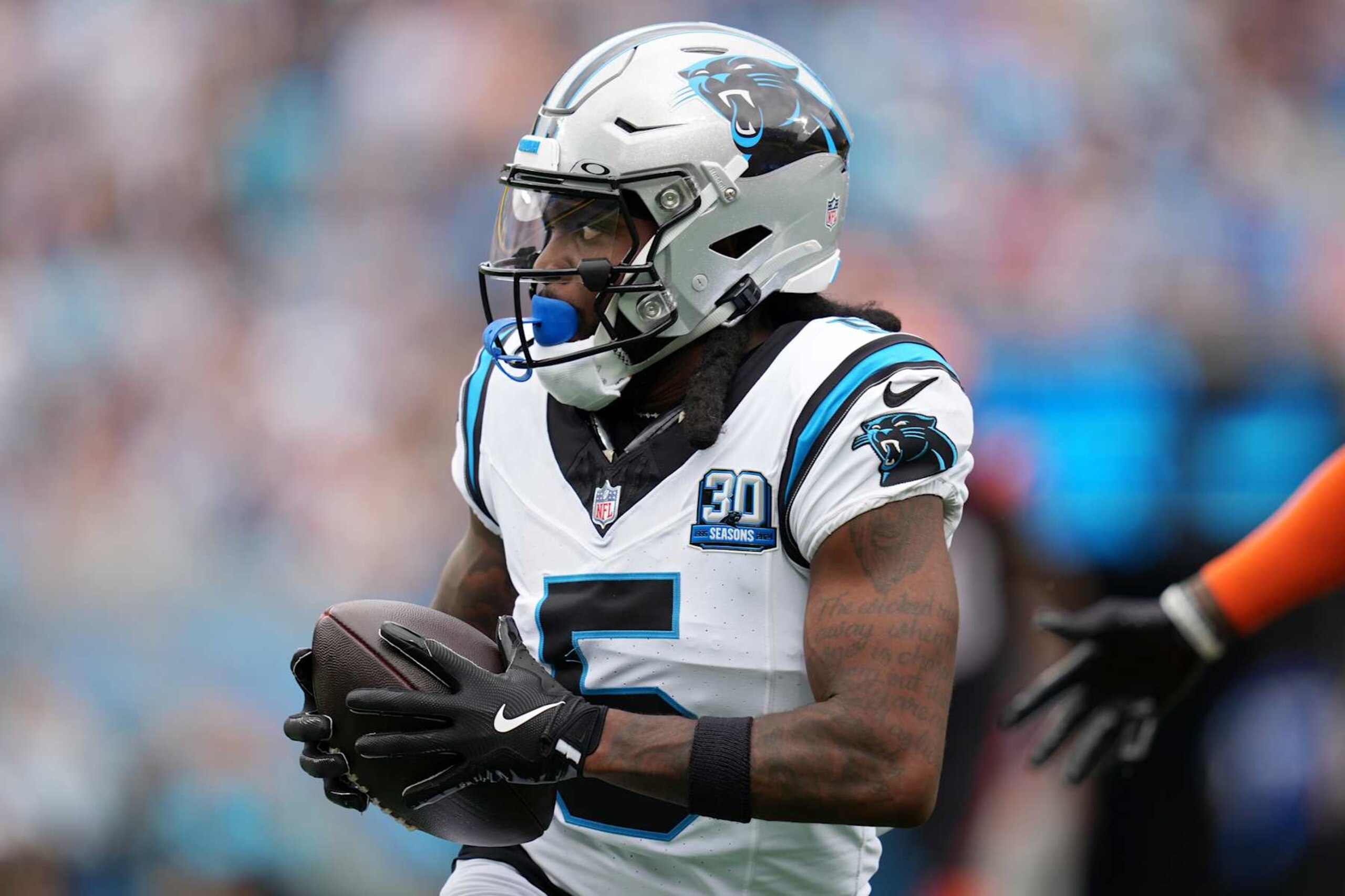 CHARLOTTE, NORTH CAROLINA - SEPTEMBER 29: Diontae Johnson #5 of the Carolina Panthers catches a pass against the Cincinnati Bengals during the first quarter at Bank of America Stadium on September 29, 2024 in Charlotte, North Carolina. (Photo by Grant Halverson/Getty Images)