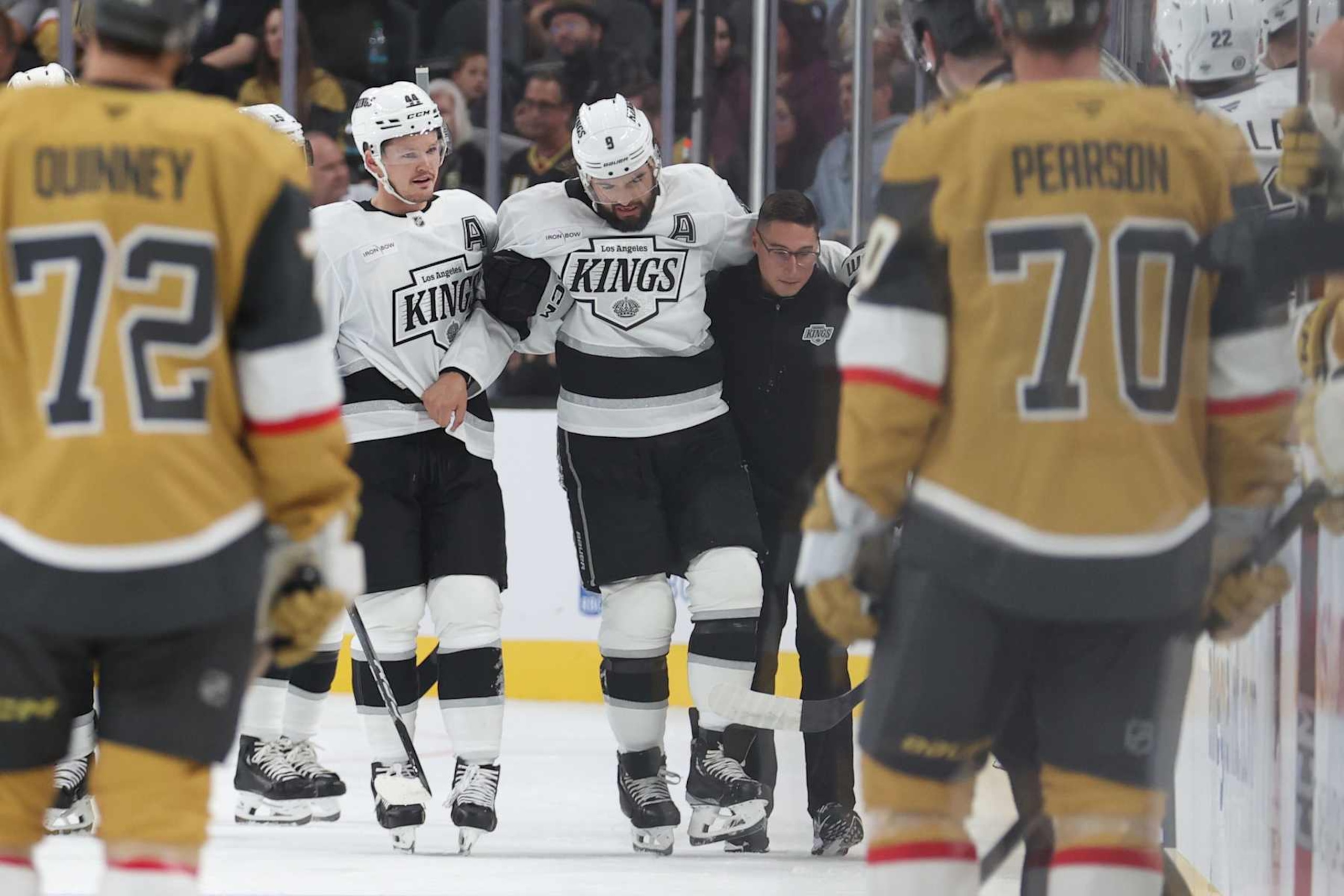 LAS VEGAS, NEVADA - SEPTEMBER 25: Drew Doughty #8 of the Los Angeles Kings reacts after suffering an injury during the first period against the Vegas Golden Knights at T-Mobile Arena on September 25, 2024 in Las Vegas, Nevada.  (Photo by Zak Krill/NHLI via Getty Images)