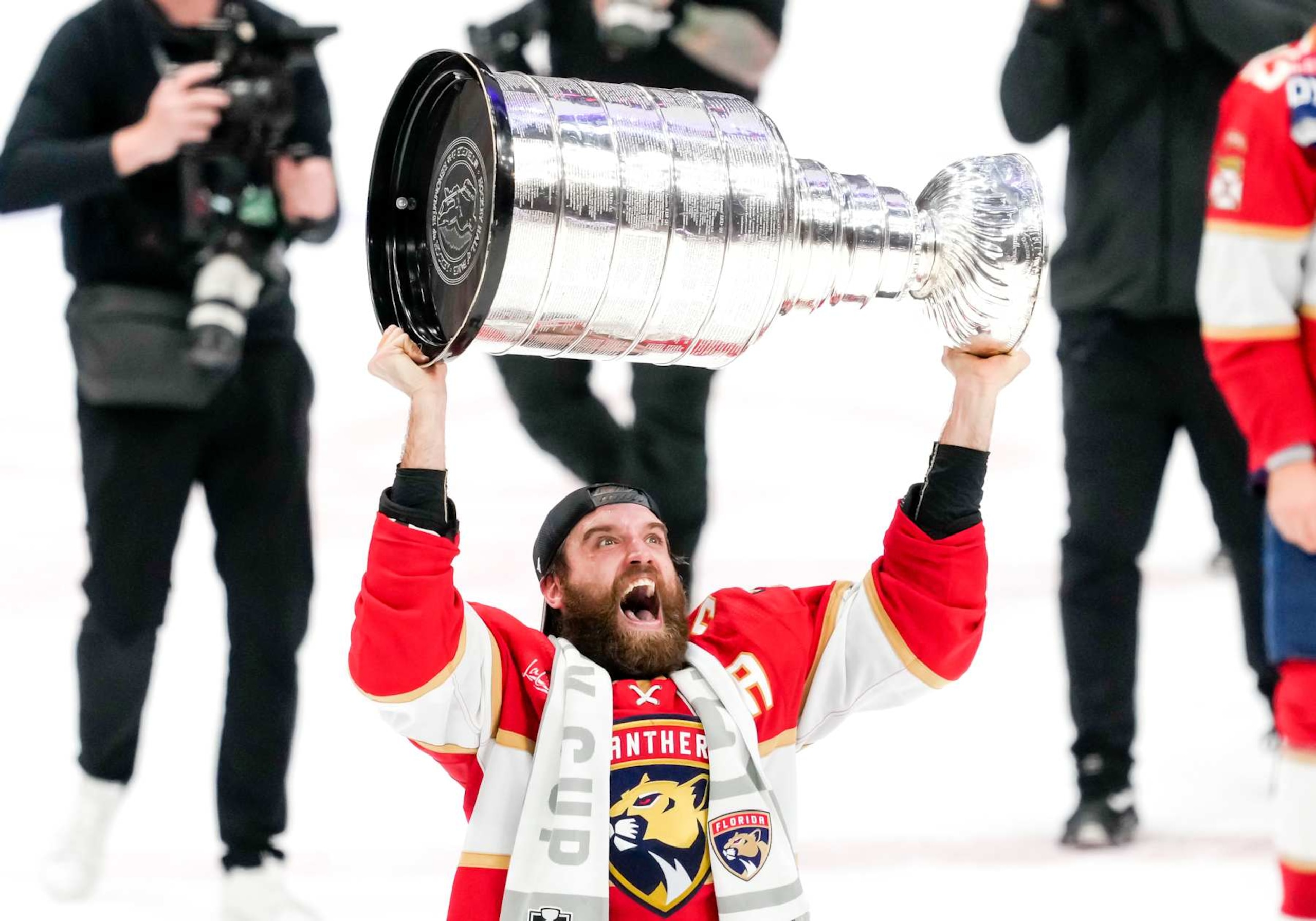 SUNRISE, FL - JUNE 24:  Florida Panthers defenseman Aaron Ekblad (5) raise the Stanley cup during the NHL Stanley Cup Finals, Game 7 between the Florida Panthers and Edmonton Oilers on June 24th, 2024 at Amerant Bank Arena in Sunrise, FL. (Photo by Andrew Bershaw/Icon Sportswire via Getty Images)