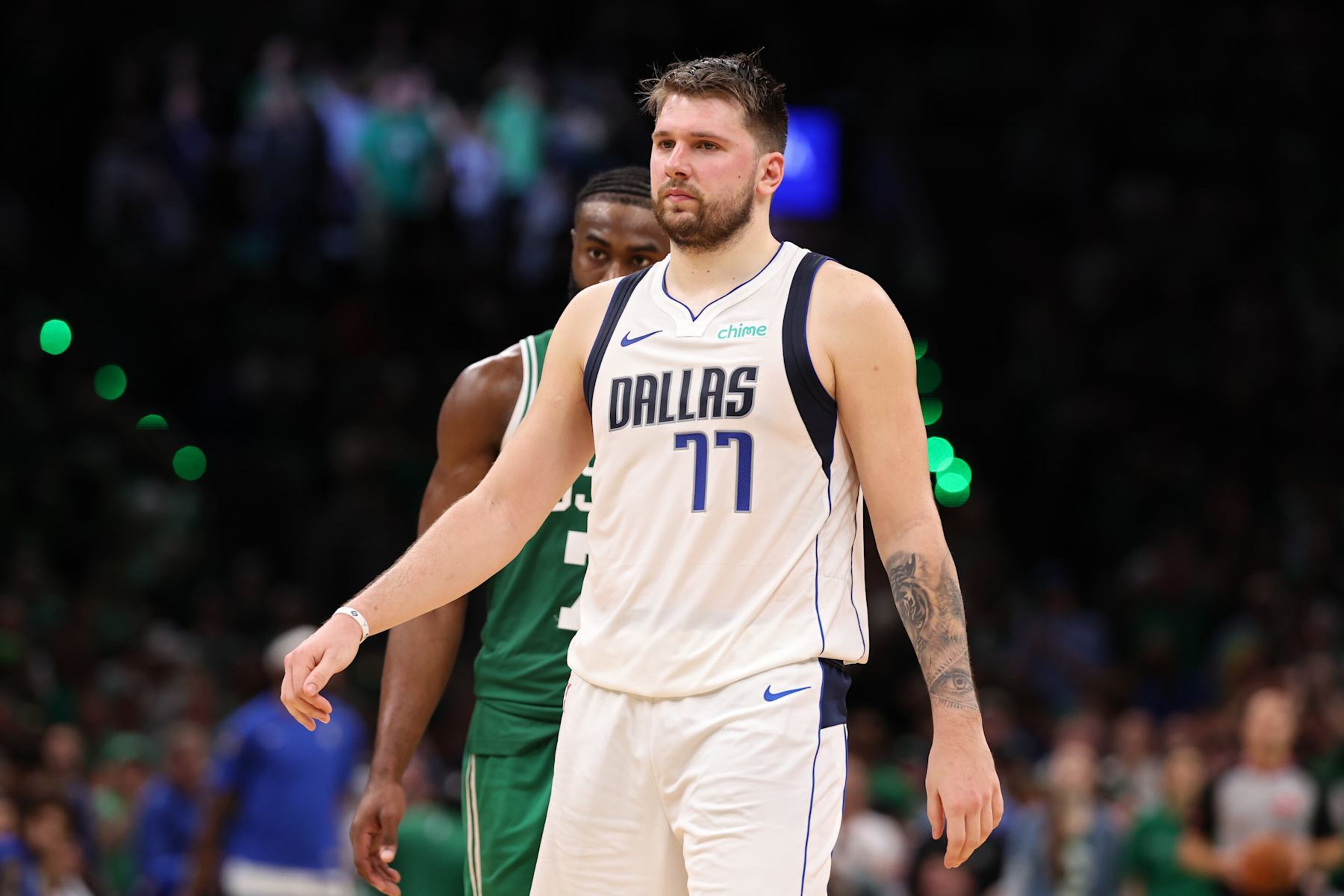 BOSTON, MASSACHUSETTS - JUNE 17: Luka Doncic #77 of the Dallas Mavericks looks on during the fourth quarter of Game Five of the 2024 NBA Finals against the Boston Celtics at TD Garden on June 17, 2024 in Boston, Massachusetts. NOTE TO USER: User expressly acknowledges and agrees that, by downloading and or using this photograph, User is consenting to the terms and conditions of the Getty Images License Agreement. (Photo by Elsa/Getty Images) BOSTON, MASSACHUSETTS - JUNE 17: Luka Doncic #77 of the Dallas Mavericks looks on during the fourth quarter of Game Five of the 2024 NBA Finals against the Boston Celtics at TD Garden on June 17, 2024 in Boston, Massachusetts. NOTE TO USER: User expressly acknowledges and agrees that, by downloading and or using this photograph, User is consenting to the terms and conditions of the Getty Images License Agreement. (Photo by Elsa/Getty Images)