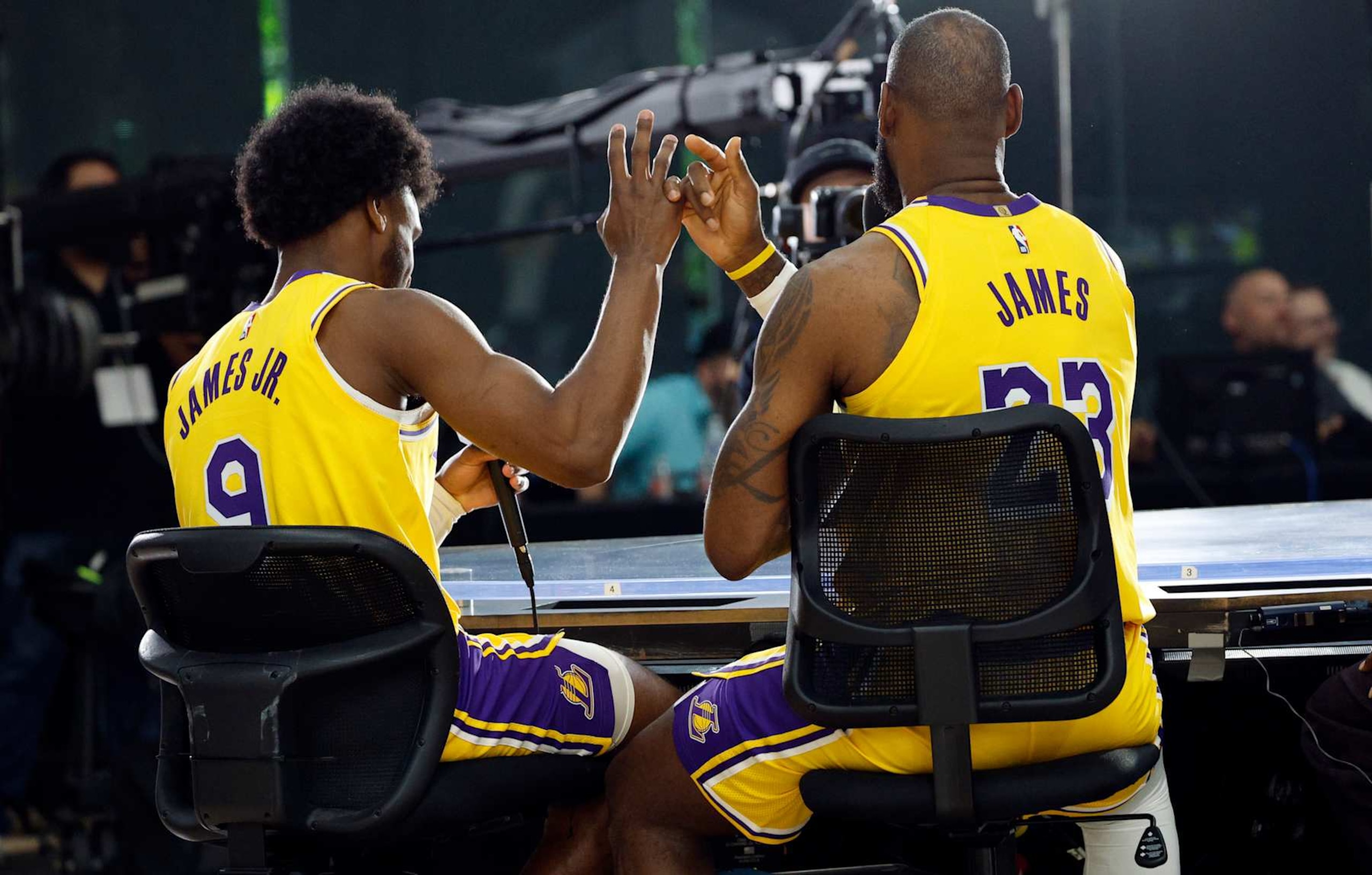 EL SEGUNDO, CALIFORNIA - SEPTEMBER 30: LeBron James #23 of the Los Angeles Lakers and his son Bronny James Jr. #9 attend the Los Angeles Lakers media day at UCLA Health Training Center on September 30, 2024 in El Segundo, California. NOTE TO USER: User expressly acknowledges and agrees that, by downloading and or using this photograph, User is consenting to the terms and conditions of the Getty Images License Agreement. (Photo by Kevork Djansezian/Getty Images) EL SEGUNDO, CALIFORNIA - SEPTEMBER 30: LeBron James #23 of the Los Angeles Lakers and his son Bronny James Jr. #9 attend the Los Angeles Lakers media day at UCLA Health Training Center on September 30, 2024 in El Segundo, California. NOTE TO USER: User expressly acknowledges and agrees that, by downloading and or using this photograph, User is consenting to the terms and conditions of the Getty Images License Agreement. (Photo by Kevork Djansezian/Getty Images)
