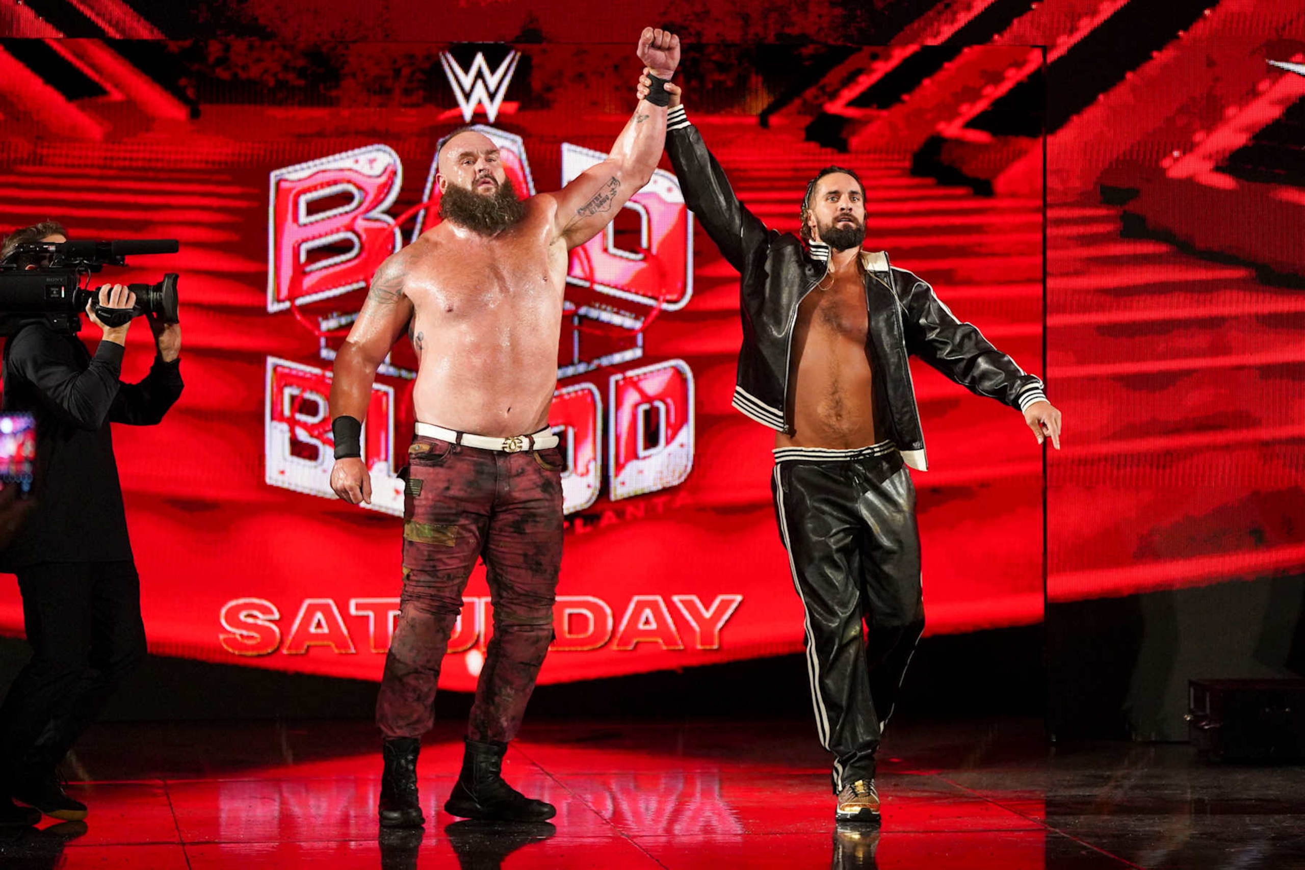 EVANSVILLE, INDIANA - SEPTEMBER 30: Braun Strowman and Seth Rollins Celebrate win during Monday night RAW at Ford Center on September 30, 2024 in Evansville, Indiana.  (Photo by WWE/Getty Images)