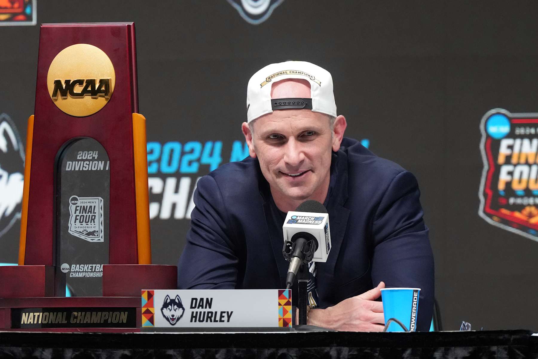 GLENDALE, ARIZONA - APRIL 08:  Head coach Dan Hurley of the Connecticut Huskies addresses the media after the National College Basketball Championship game against the Purdue Boilermakers at State Farm Stadium on April 08, 2024 in Glendale, Arizona.  (Photo by Mitchell Layton/Getty Images)
