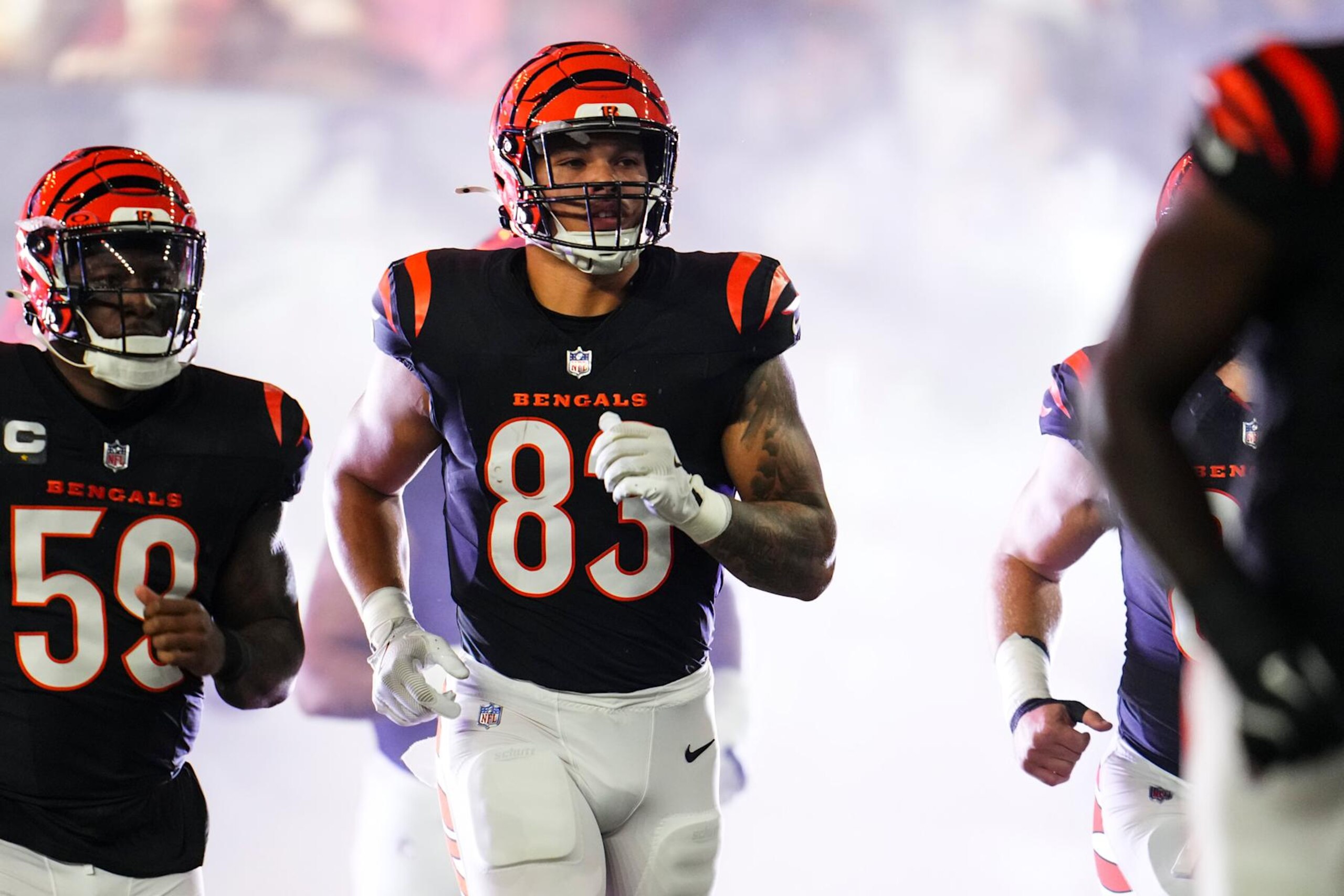 CINCINNATI, OH - SEPTEMBER 23: Erick All Jr. #83 of the Cincinnati Bengals runs out of the tunnel prior to an NFL football game against the Washington Commanders at Paycor Stadium on September 23, 2024 in Cincinnati, Ohio. (Photo by Cooper Neill/Getty Images)
