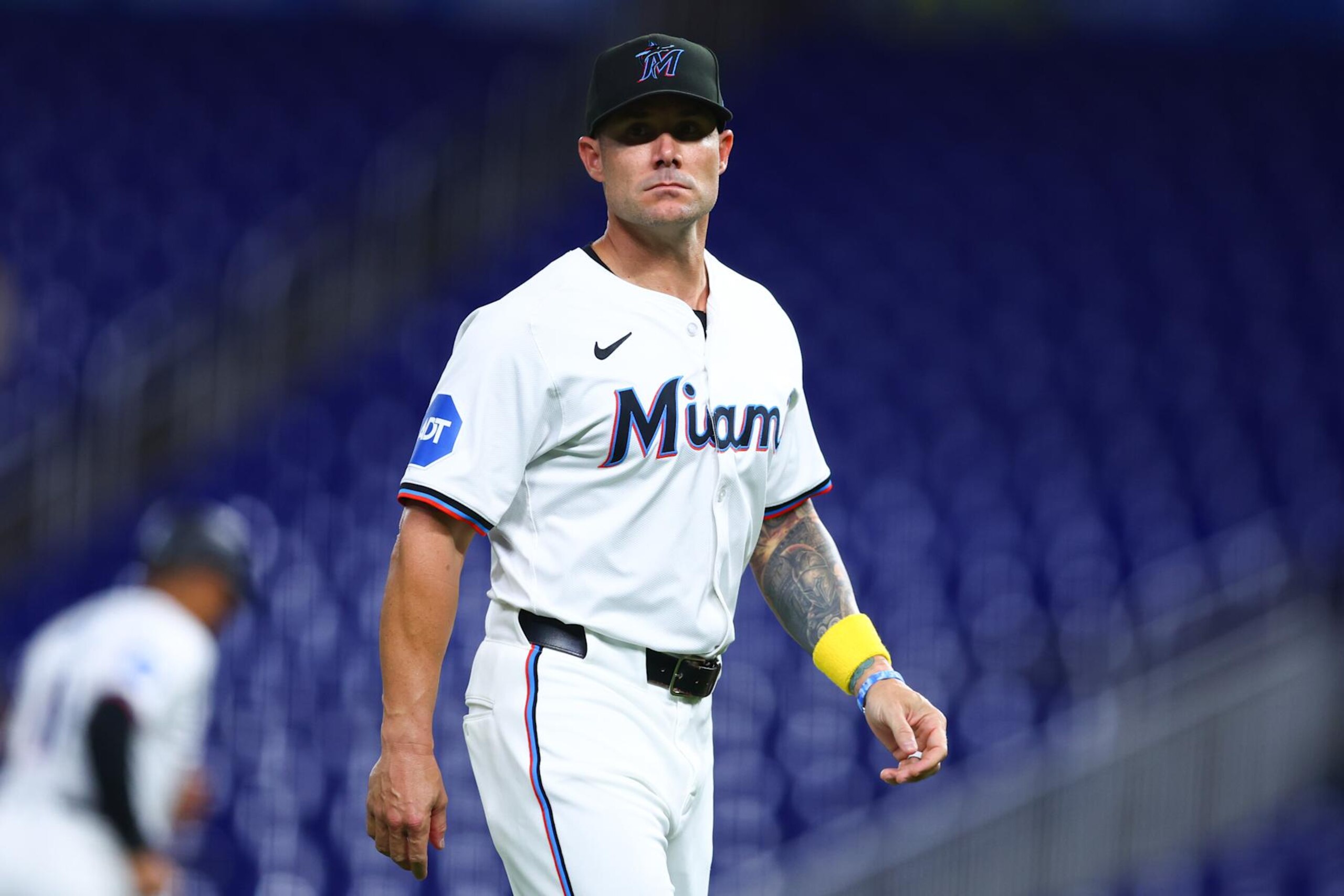 MIAMI, FLORIDA - SEPTEMBER 03: Skip Schumaker #45 of the Miami Marlins looks on during the second inning of the game against the Washington Nationals at loanDepot park on September 03, 2024 in Miami, Florida. (Photo by Megan Briggs/Getty Images)