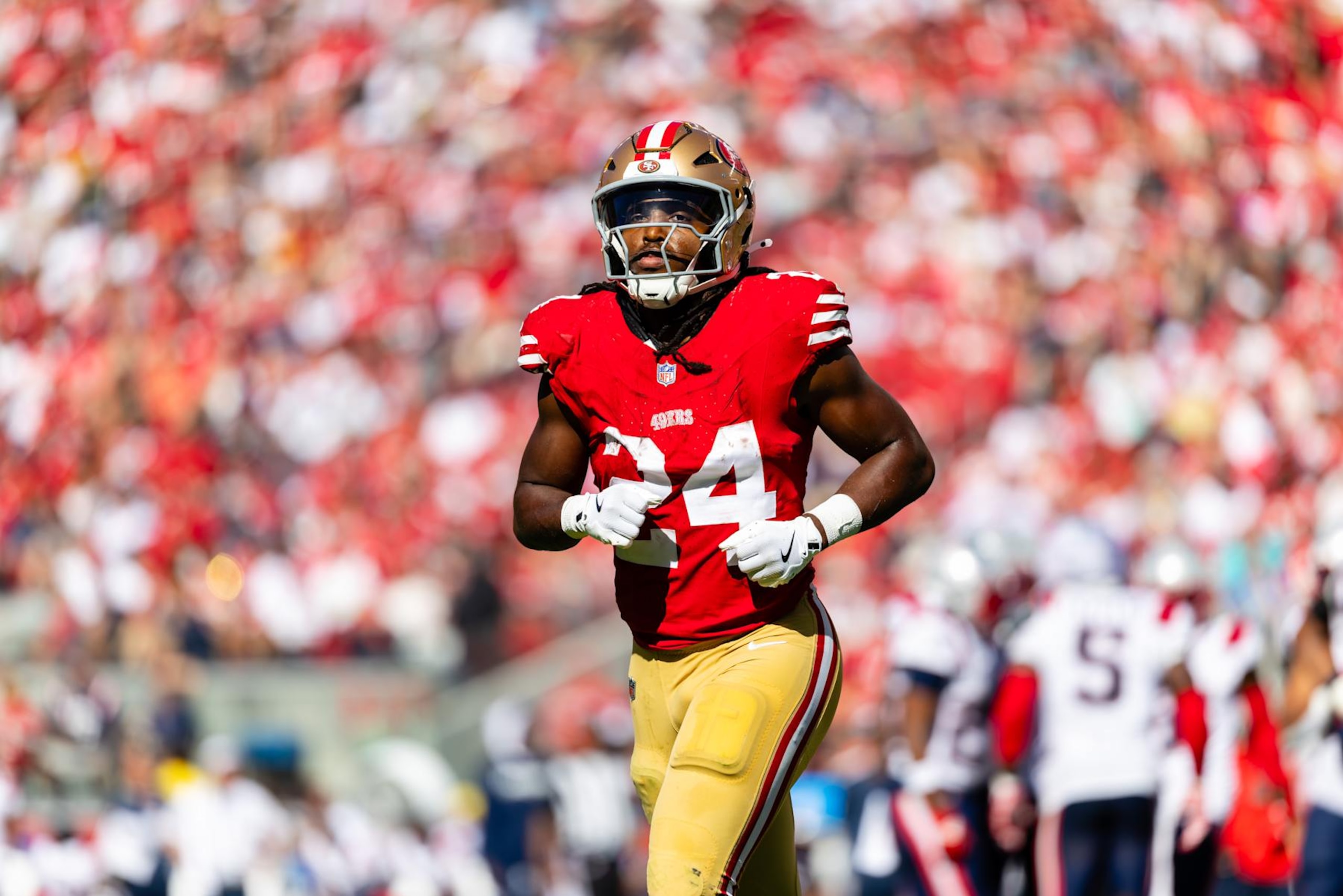SANTA CLARA, CA - SEPTEMBER 29: San Francisco 49ers running back Jordan Mason (24) runs off the field during the NFL game between the New England Patriots and the San Francisco 49ers on September 29, 2024 at Levi's Stadium in Santa Clara, CA. (Photo by Matthew Huang/Icon Sportswire via Getty Images)