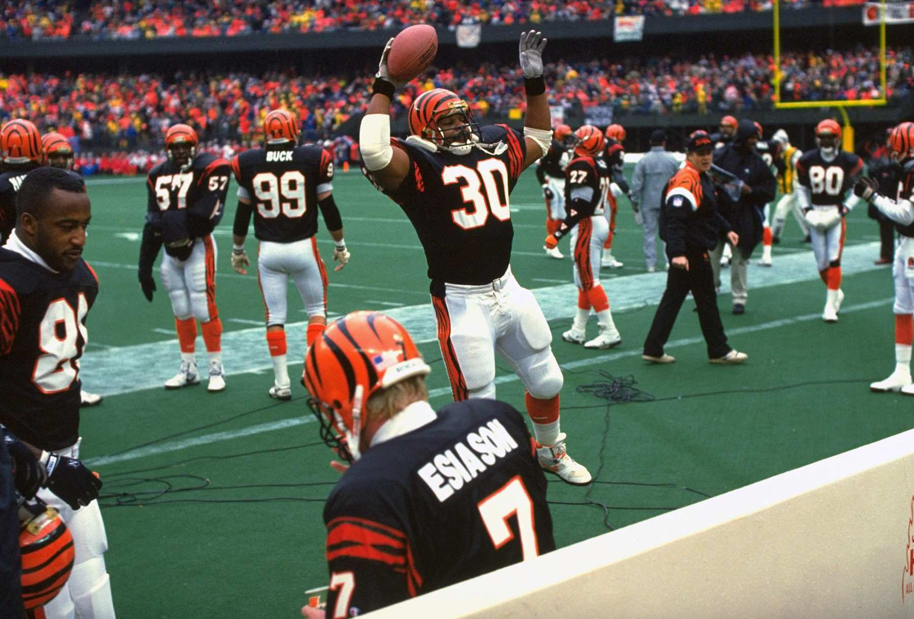 Football: NFL Playoffs: Cincinnati Bengals Ickey Woods (30) victorious on sidelines after scoring touchdown vs Houston Oilers at Riverfront Stadium. Woods doing Ickey Shuffle. Cincinnati, OH 1/6/1991 CREDIT: Al Tielemans (Photo by Al Tielemans/Sports Illustrated via Getty Images) (Set Number: X40843)