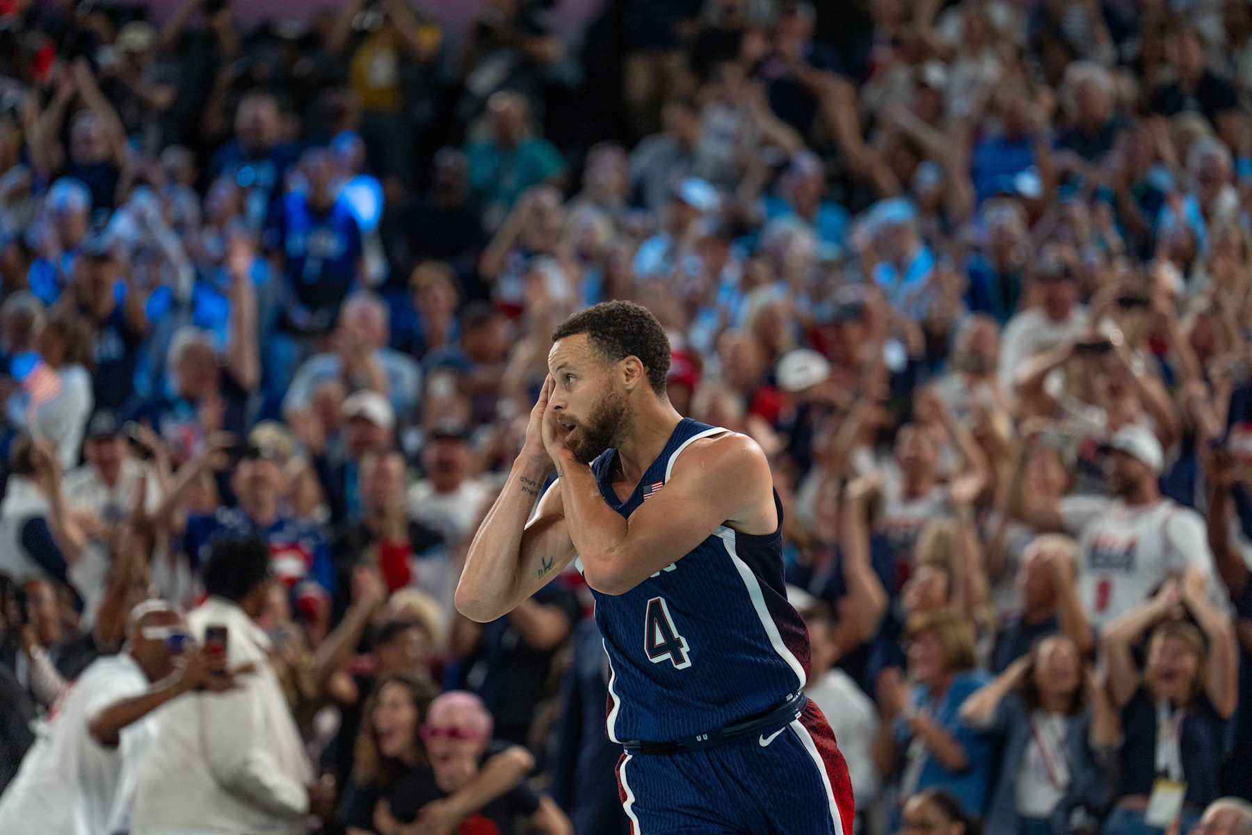 PARIS, FRANCE - AUGUST 10: Players of Team USA celebrate as they win gold medal after defeating France in Men's Gold Medal game on day fifteen of the Olympic Games Paris 2024 at Bercy Arena on August 10, 2024 in Paris, France. (Photo by Aytac Unal/Anadolu via Getty Images)