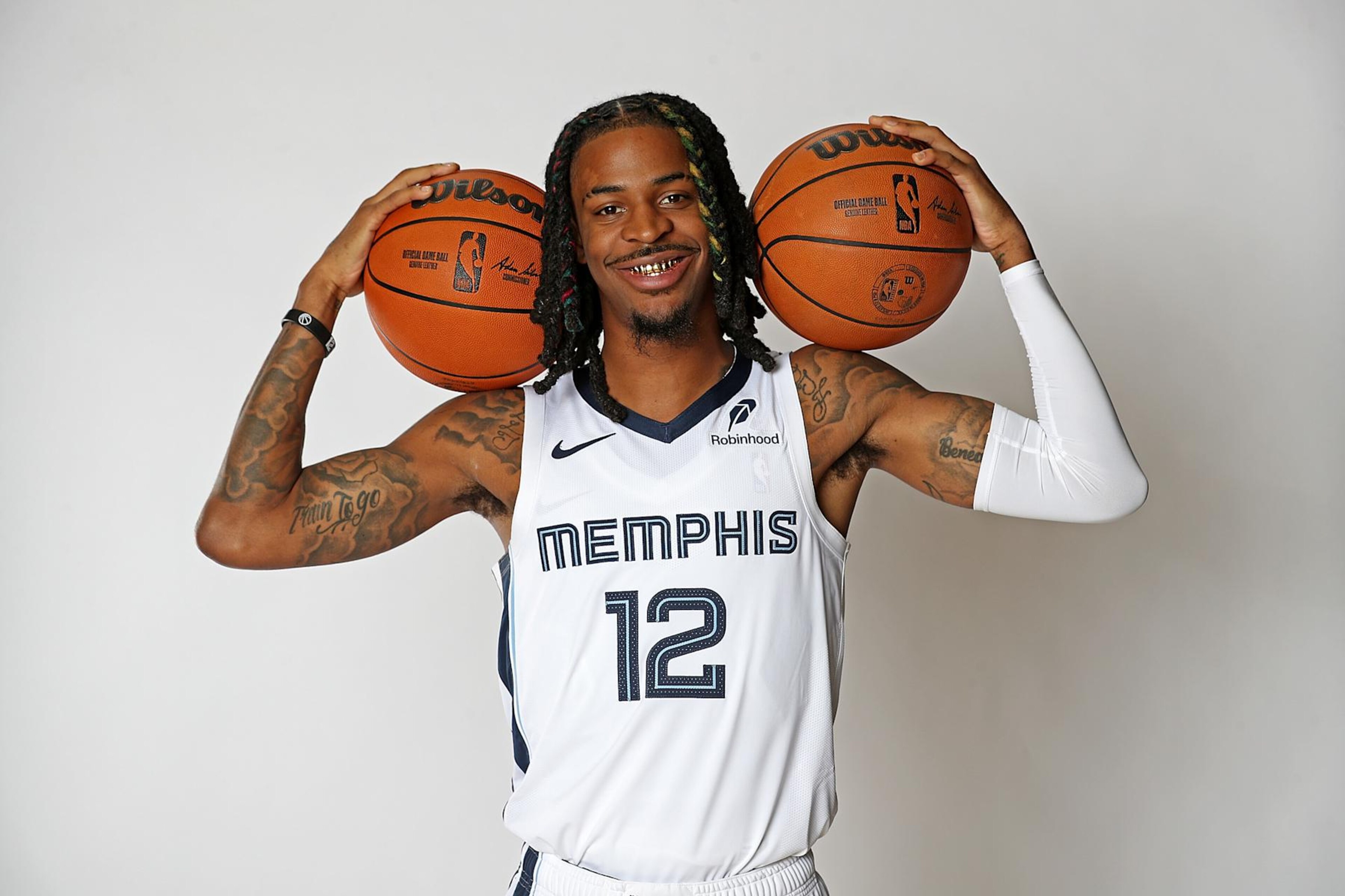 MEMPHIS, TENNESSEE - SEPTEMBER 30: Ja Morant #12 of the Memphis Grizzlies poses for a photo during media day at FedExForum on September 30, 2024 in Memphis, Tennessee. NOTE TO USER: User expressly acknowledges and agrees that, by downloading and or using this photograph, User is consenting to the terms and conditions of the Getty Images License Agreement. (Photo by Justin Ford/Getty Images) MEMPHIS, TENNESSEE - SEPTEMBER 30: Ja Morant #12 of the Memphis Grizzlies poses for a photo during media day at FedExForum on September 30, 2024 in Memphis, Tennessee. NOTE TO USER: User expressly acknowledges and agrees that, by downloading and or using this photograph, User is consenting to the terms and conditions of the Getty Images License Agreement. (Photo by Justin Ford/Getty Images)
