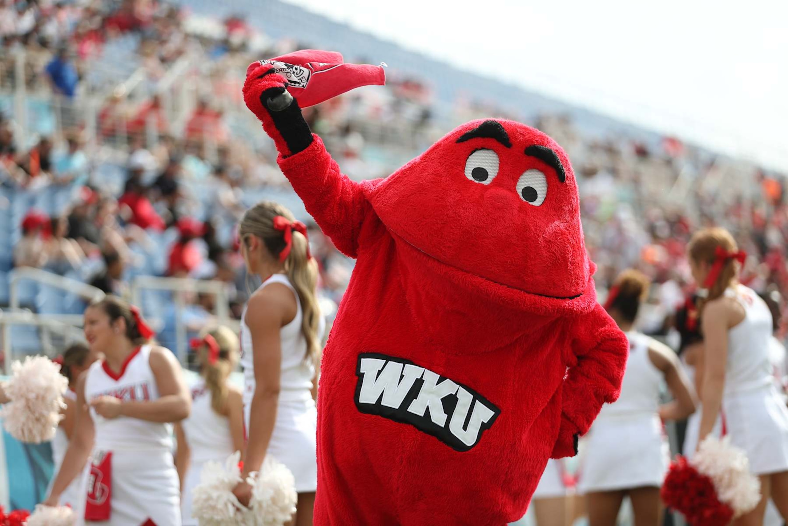 BOCA RATON, FL - DECEMBER 18: Western Kentucky Hilltoppers mascot Big Red waves a towel in celebration of a touchdown during the RoofClaim.com Boca Raton Bowl between the Western Kentucky Hilltoppers and the Appalachian State Mountaineers on December 18, 2021 at FAU Stadium in Boca Raton, FL. (Photo by Peter Joneleit/Icon Sportswire via Getty Images) BOCA RATON, FL - DECEMBER 18: Western Kentucky Hilltoppers mascot Big Red waves a towel in celebration of a touchdown during the RoofClaim.com Boca Raton Bowl between the Western Kentucky Hilltoppers and the Appalachian State Mountaineers on December 18, 2021 at FAU Stadium in Boca Raton, FL. (Photo by Peter Joneleit/Icon Sportswire via Getty Images)