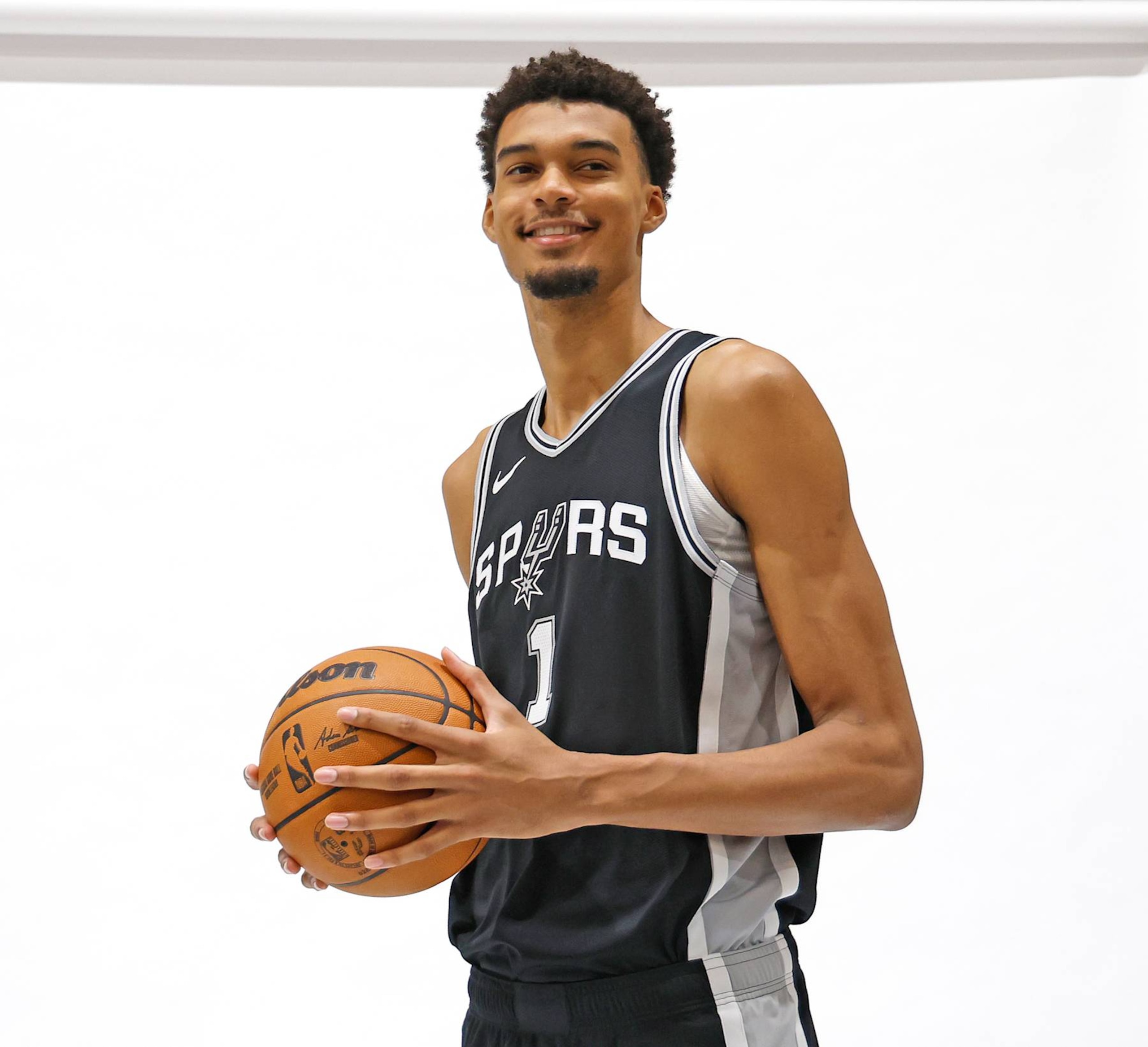 SAN ANTONIO, TX - SEPTEMBER 30: Victor Wembanyama #1 of the San Antonio Spurs poses at San Antonio Spurs Media Day at the Victory Capital Performance Center on September 30, 2024 in San Antonio, Texas. NOTE TO USER: User expressly acknowledges and agrees that, by downloading and or using this photograph, User is consenting to terms and conditions of the Getty Images License Agreement. (Photo by Ronald Cortes/Getty Images) SAN ANTONIO, TX - SEPTEMBER 30: Victor Wembanyama #1 of the San Antonio Spurs poses at San Antonio Spurs Media Day at the Victory Capital Performance Center on September 30, 2024 in San Antonio, Texas. NOTE TO USER: User expressly acknowledges and agrees that, by downloading and or using this photograph, User is consenting to terms and conditions of the Getty Images License Agreement. (Photo by Ronald Cortes/Getty Images)