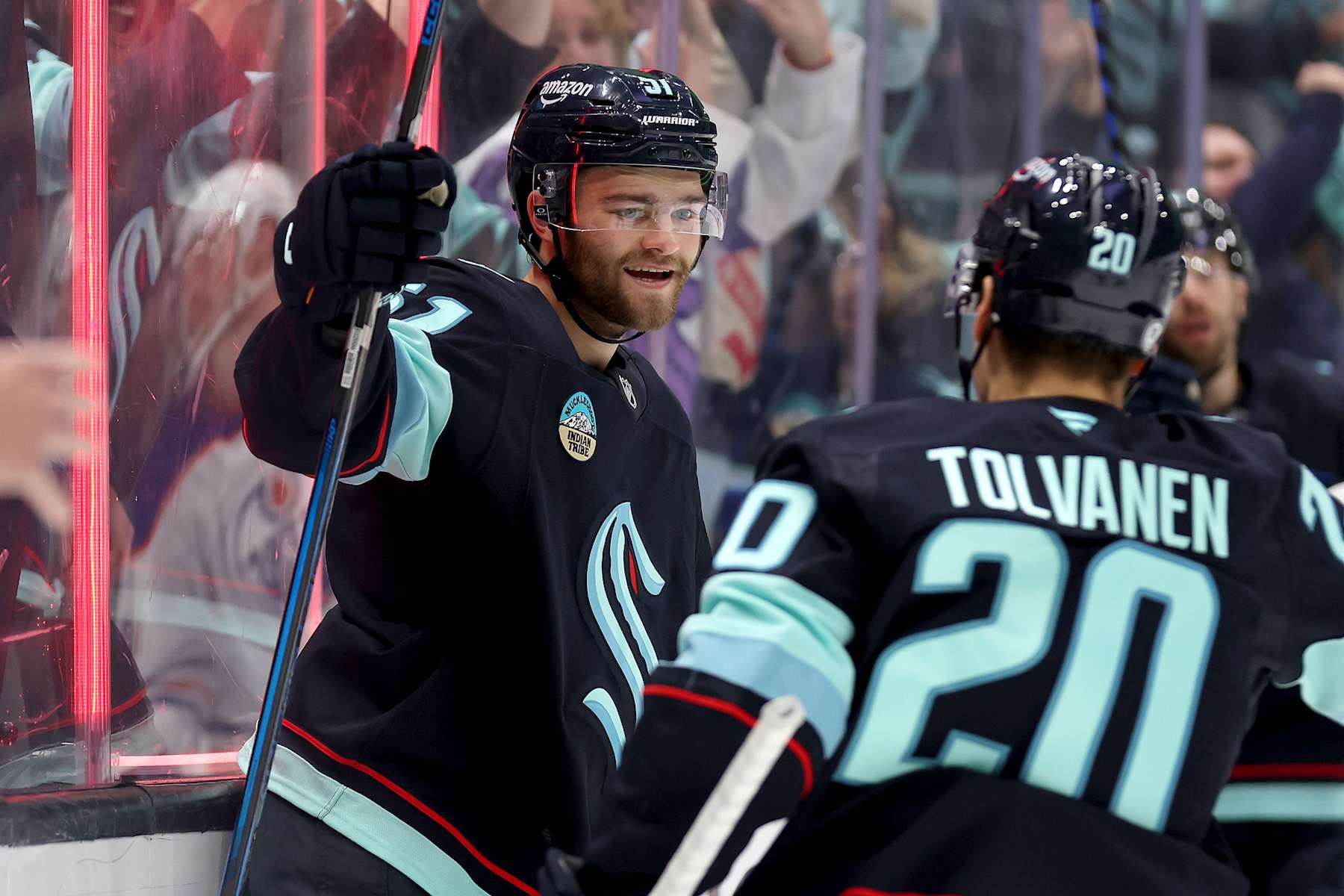 SEATTLE, WASHINGTON - OCTOBER 02: Shane Wright #51 of the Seattle Kraken celebrates his goal during the second period against the Edmonton Oilers at Climate Pledge Arena on October 02, 2024 in Seattle, Washington.  (Photo by Steph Chambers/Getty Images)