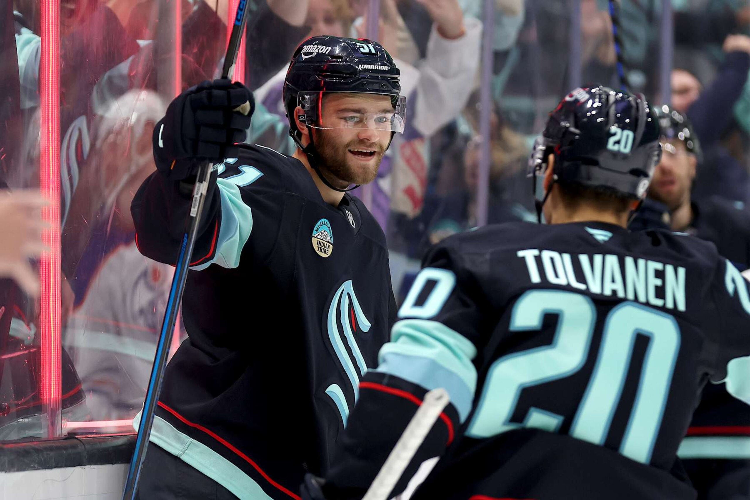 SEATTLE, WASHINGTON - OCTOBER 02: Shane Wright #51 of the Seattle Kraken celebrates his goal during the second period against the Edmonton Oilers at Climate Pledge Arena on October 02, 2024 in Seattle, Washington.  (Photo by Steph Chambers/Getty Images)