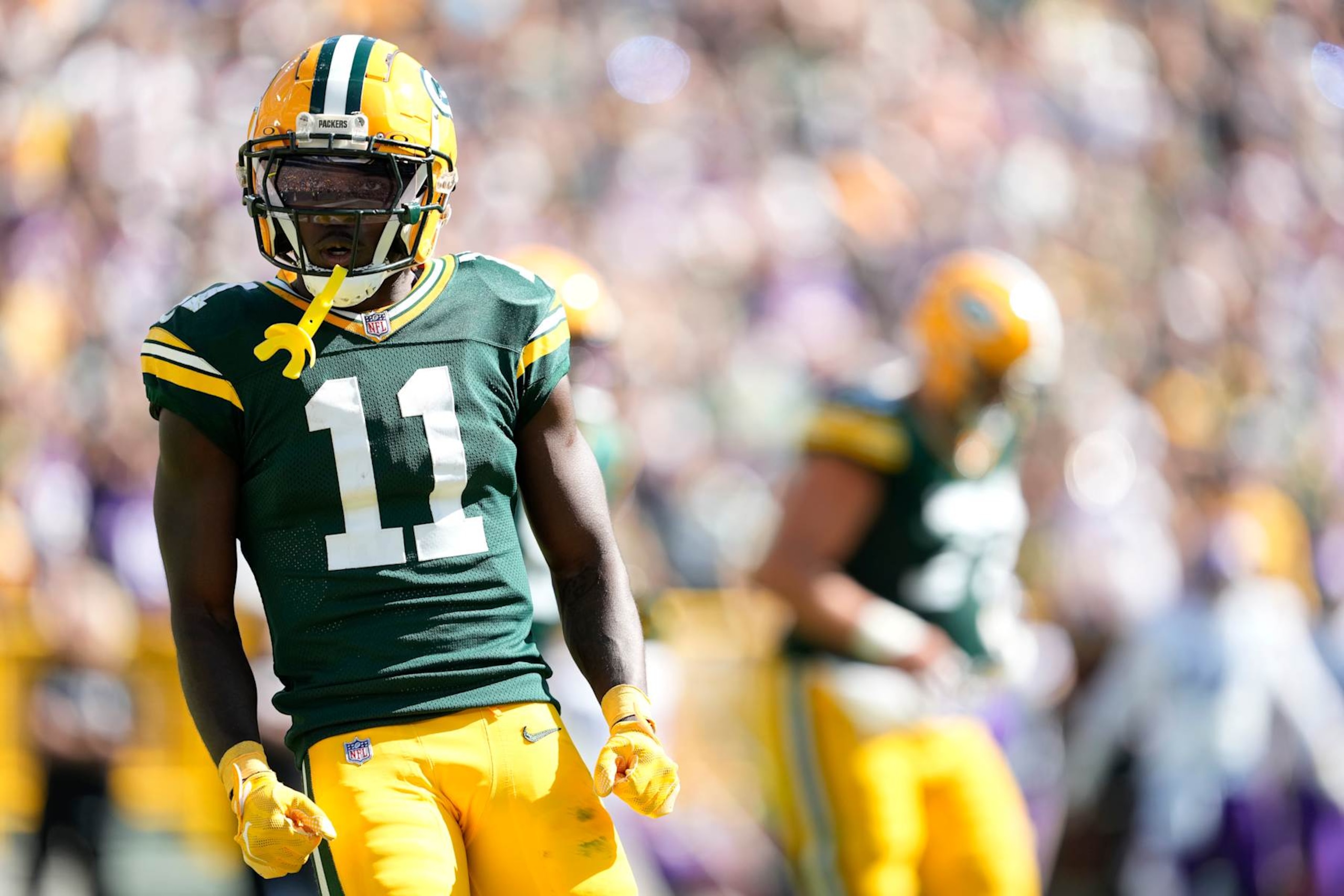 GREEN BAY, WISCONSIN - SEPTEMBER 29: Jayden Reed #11 of the Green Bay Packers celebrates a touchdown against the Minnesota Vikings during the second quarter of the game at Lambeau Field on September 29, 2024 in Green Bay, Wisconsin. (Photo by Patrick McDermott/Getty Images)
