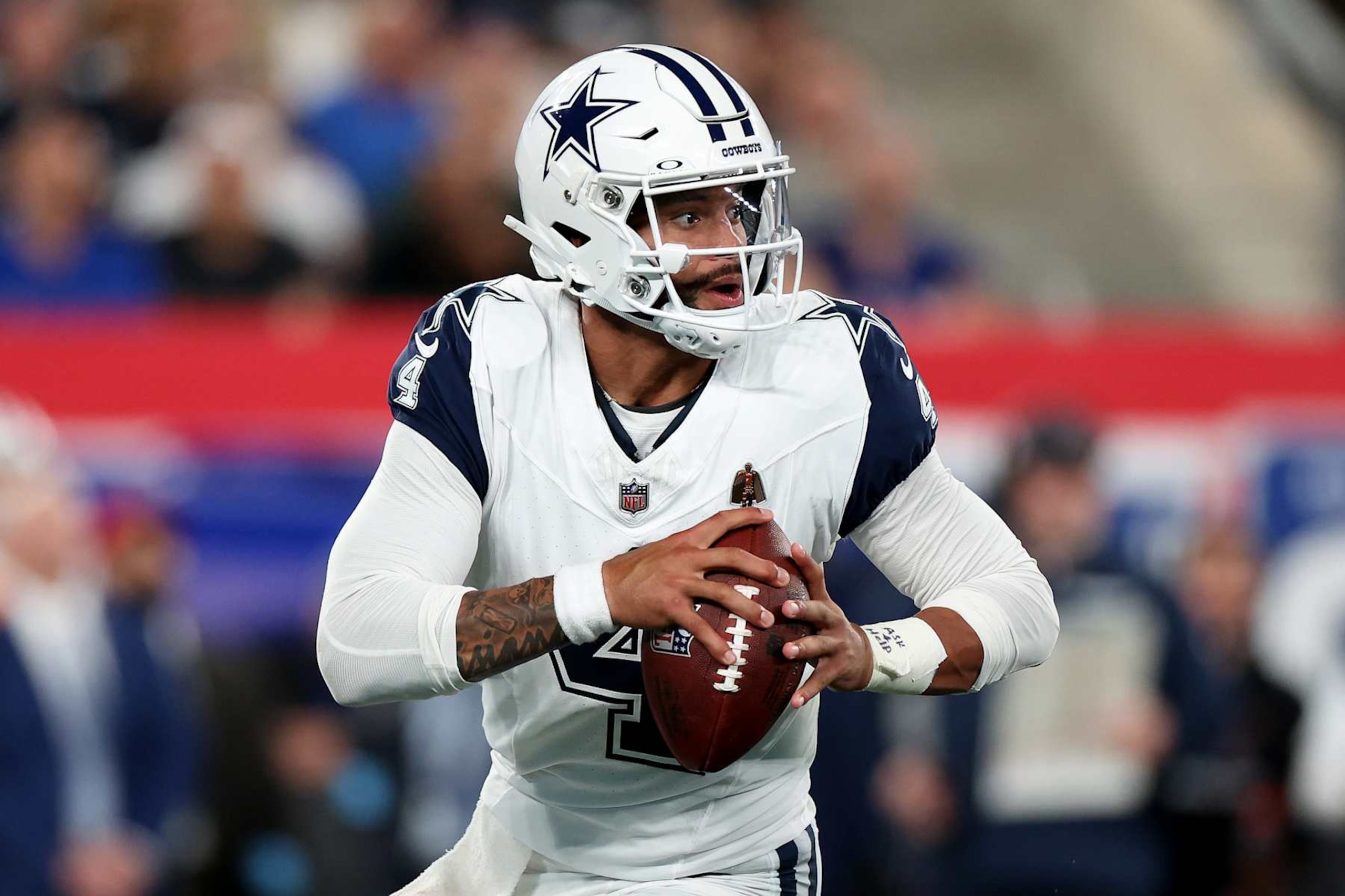EAST RUTHERFORD, NEW JERSEY - SEPTEMBER 26: Dak Prescott #4 of the Dallas Cowboys looks to pass the ball during the fourth quarter against the New York Giants at MetLife Stadium on September 26, 2024 in East Rutherford, New Jersey. (Photo by Luke Hales/Getty Images)