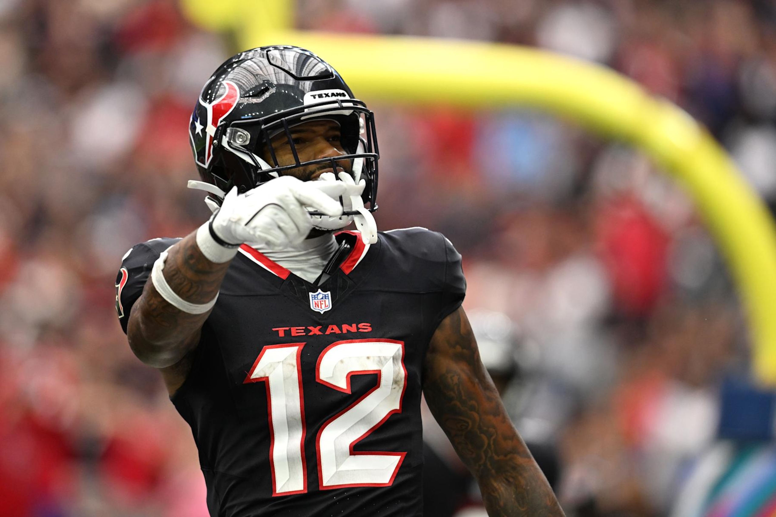 HOUSTON, TEXAS - SEPTEMBER 29: Nico Collins #12 of the Houston Texans celebrates after scoring a touchdown against the Jacksonville Jaguars during the second quarter at NRG Stadium on September 29, 2024 in Houston, Texas. (Photo by Jack Gorman/Getty Images)