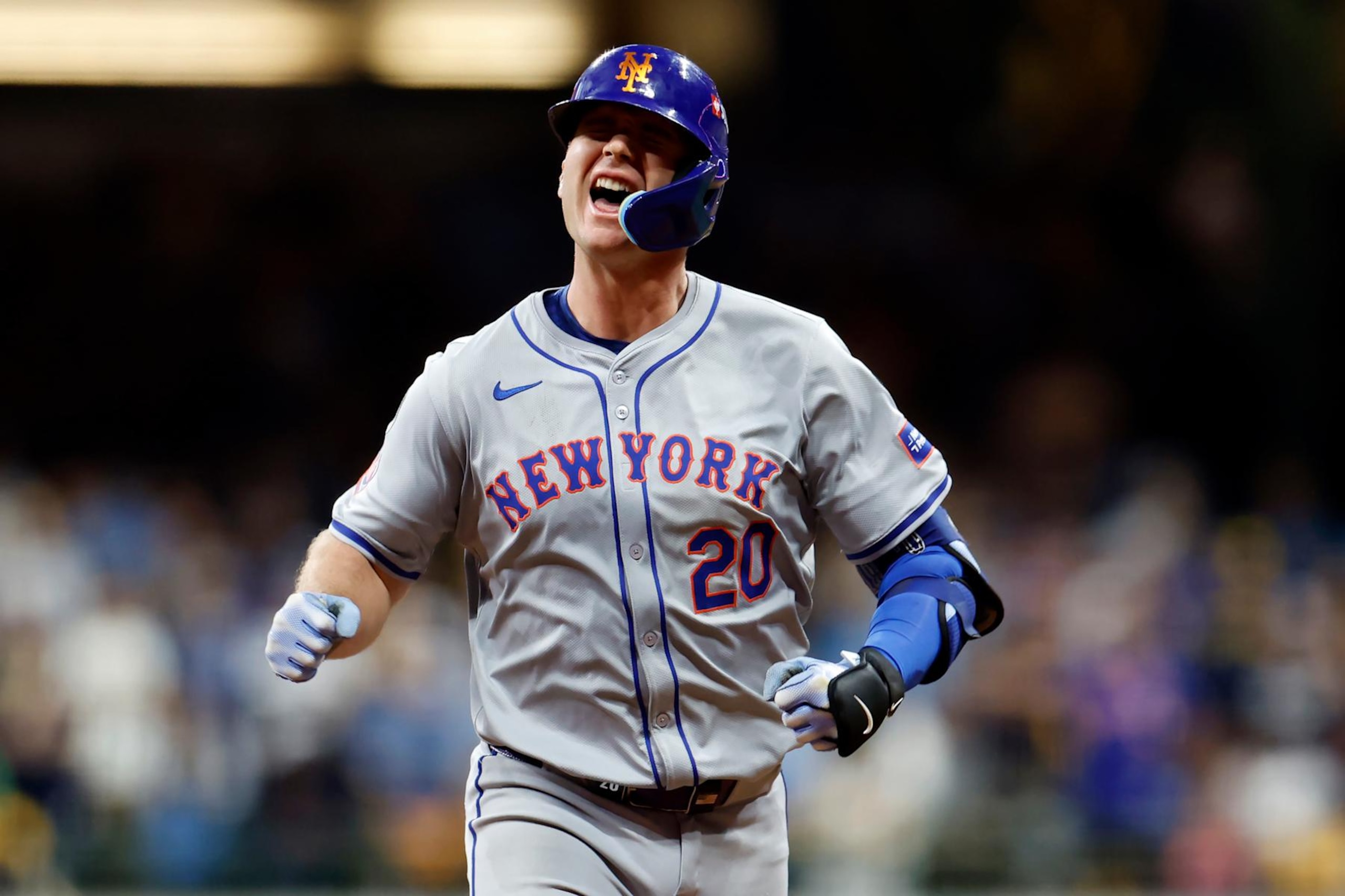 MILWAUKEE, WISCONSIN - OCTOBER 03: Pete Alonso #20 of the New York Mets rounds the bases after hitting a home run in the ninth inning against the Milwaukee Brewers during Game Three of the Wild Card Series at American Family Field on October 03, 2024 in Milwaukee, Wisconsin. (Photo by John Fisher/Getty Images)