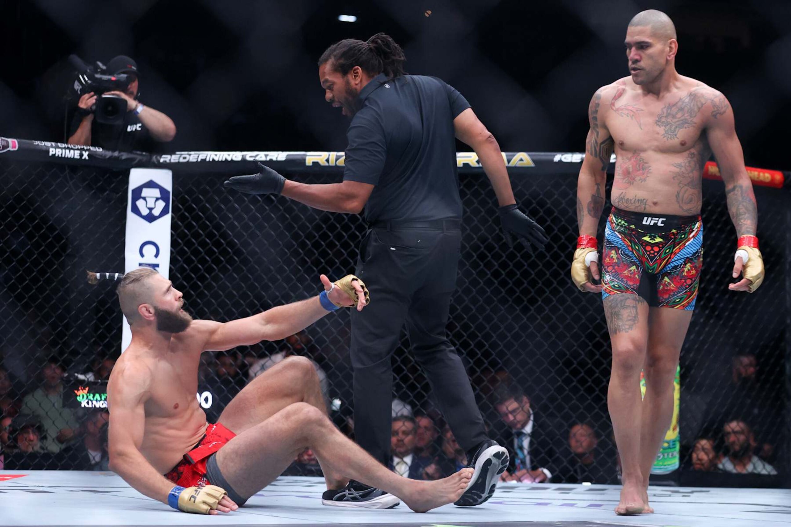 Jiri Prochazka reacts after he was knocked down while Alex Pereira