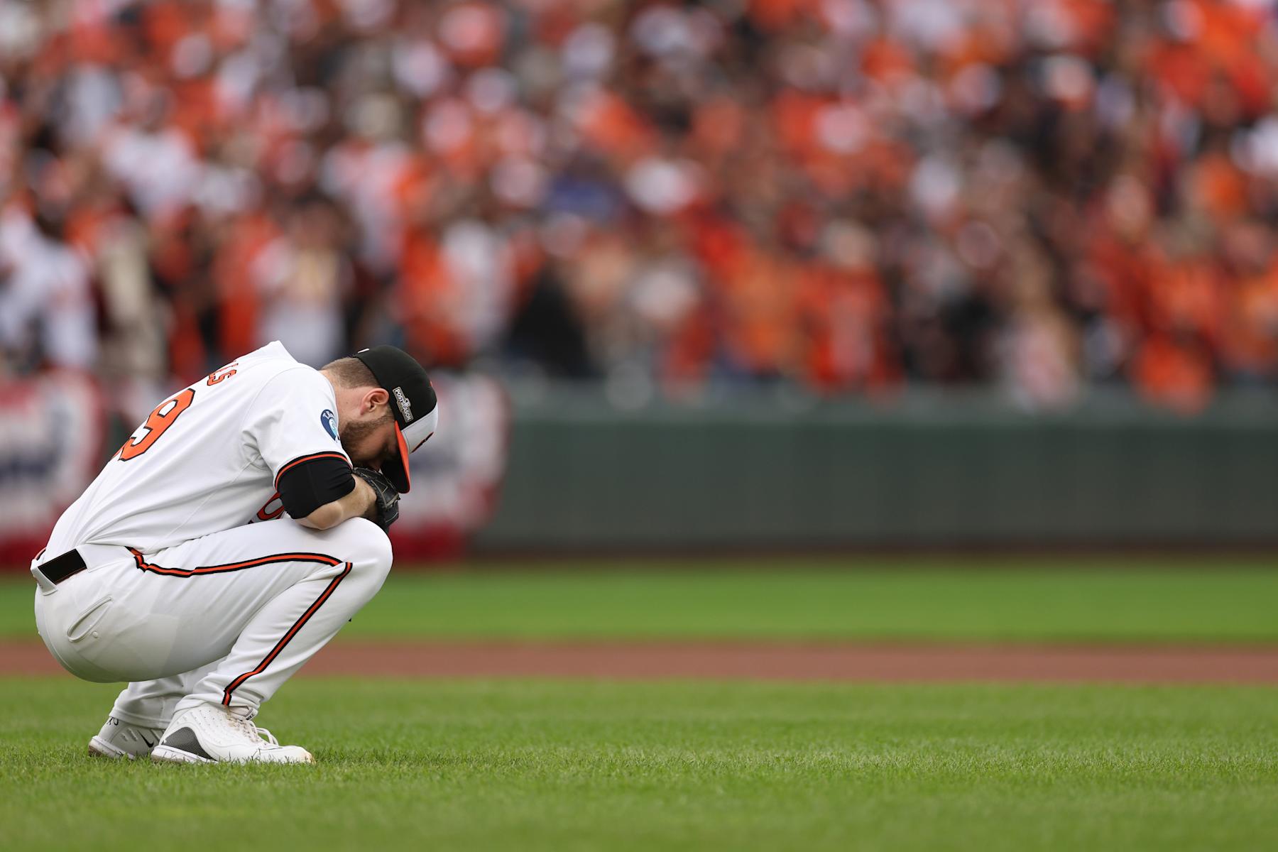 BALTIMORE, MARYLAND - OCTOBER 01: Corbin Burnes #39 of the Baltimore Orioles kneels during the first inning of Game One of the Wild Card Series against the Kansas City Royals at Oriole Park at Camden Yards on October 01, 2024 in Baltimore, Maryland. (Photo by Patrick Smith/Getty Images)