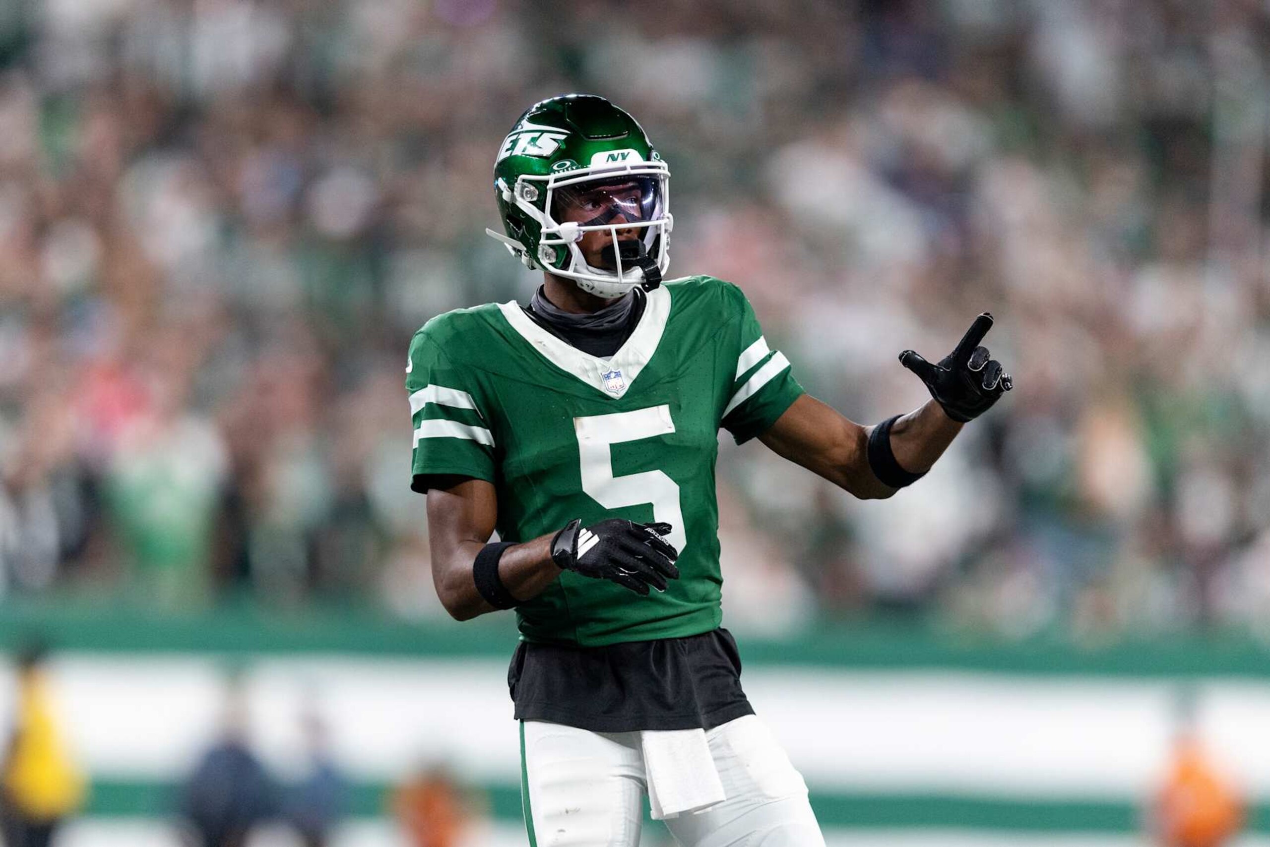 EAST RUTHERFORD, NEW JERSEY - SEPTEMBER 19: Garrett Wilson #5 of the New York Jets signals during an NFL football game between the New York Jets and the New England Patriots at MetLife Stadium on September 19, 2024 in East Rutherford, New Jersey. (Photo by Michael Owens/Getty Images)