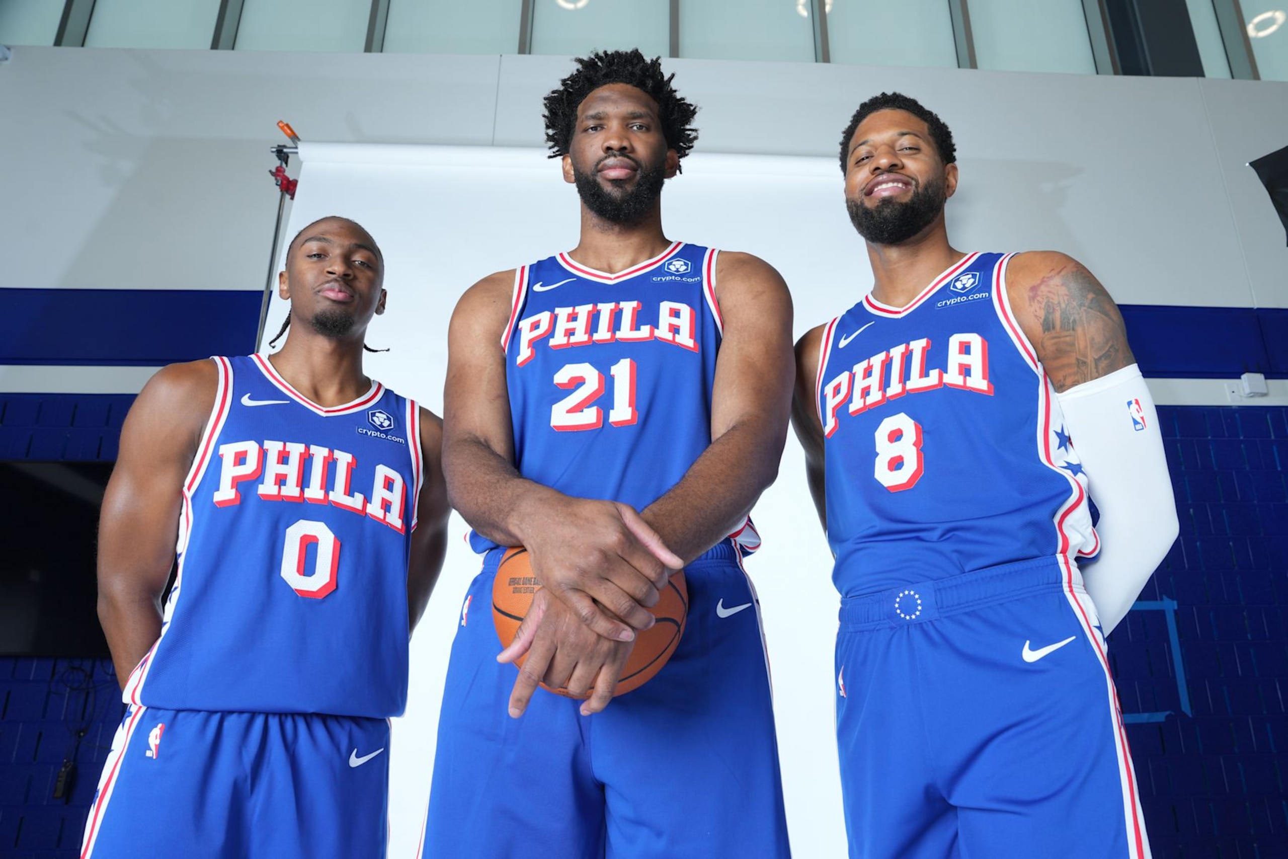 CAMDEN, NJ - SEPTEMBER 30: Tyrese Maxey #0, Joel Embiid #21, and Paul George #8 of the Philadelphia 76ers pose for a portrait during NBA Media Day on September 30, 2024 at the Philadelphia 76ers Training Complex in Camden, New Jersey. NOTE TO USER: User expressly acknowledges and agrees that, by downloading and or using this photograph, User is consenting to the terms and conditions of the Getty Images License Agreement. Mandatory Copyright Notice: Copyright 2024 NBAE (Photo by Jesse D. Garrabrant/NBAE via Getty Images) CAMDEN, NJ - SEPTEMBER 30: Tyrese Maxey #0, Joel Embiid #21, and Paul George #8 of the Philadelphia 76ers pose for a portrait during NBA Media Day on September 30, 2024 at the Philadelphia 76ers Training Complex in Camden, New Jersey. NOTE TO USER: User expressly acknowledges and agrees that, by downloading and or using this photograph, User is consenting to the terms and conditions of the Getty Images License Agreement. Mandatory Copyright Notice: Copyright 2024 NBAE (Photo by Jesse D. Garrabrant/NBAE via Getty Images)