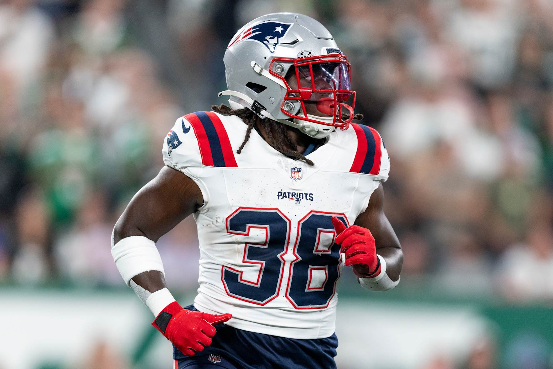 EAST RUTHERFORD, NEW JERSEY - SEPTEMBER 19: Rhamondre Stevenson #38 of the New England Patriots runs during an NFL football game between the New York Jets and the New England Patriots at MetLife Stadium on September 19, 2024 in East Rutherford, New Jersey. (Photo by Michael Owens/Getty Images)