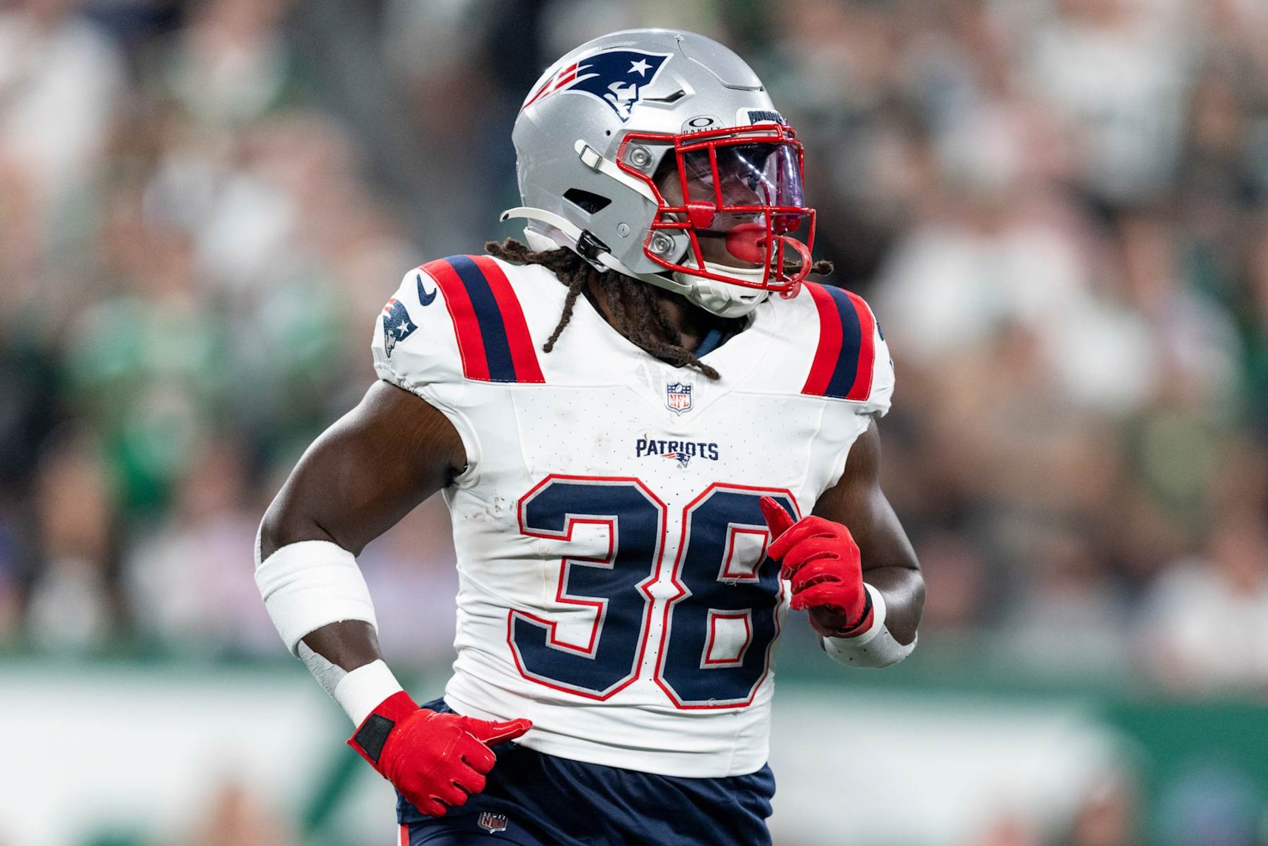 EAST RUTHERFORD, NEW JERSEY - SEPTEMBER 19: Rhamondre Stevenson #38 of the New England Patriots runs during an NFL football game between the New York Jets and the New England Patriots at MetLife Stadium on September 19, 2024 in East Rutherford, New Jersey. (Photo by Michael Owens/Getty Images) EAST RUTHERFORD, NEW JERSEY - SEPTEMBER 19: Rhamondre Stevenson #38 of the New England Patriots runs during an NFL football game between the New York Jets and the New England Patriots at MetLife Stadium on September 19, 2024 in East Rutherford, New Jersey. (Photo by Michael Owens/Getty Images)