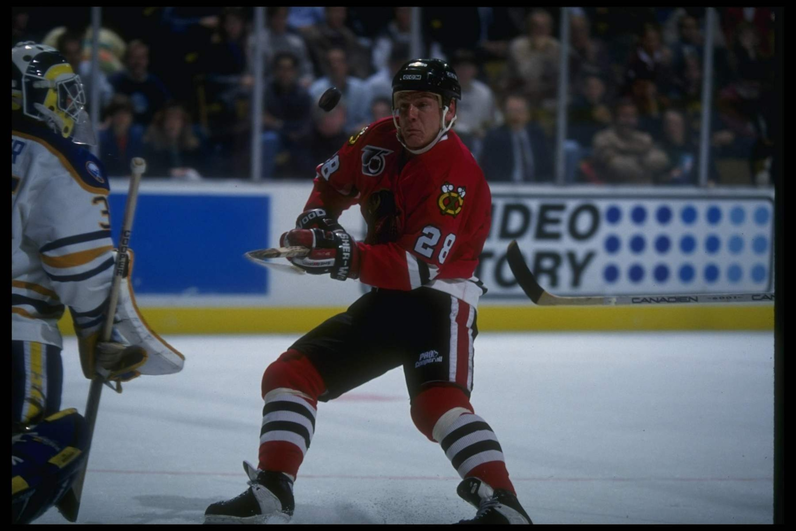 22 Nov 1991:  Rightwinger Steve Larmer of the Chicago Blackhawks works against the Buffalo Sabres during a game at Memorial Auditorium in Buffalo, New York. Mandatory Credit: Rick Stewart  /Allsport