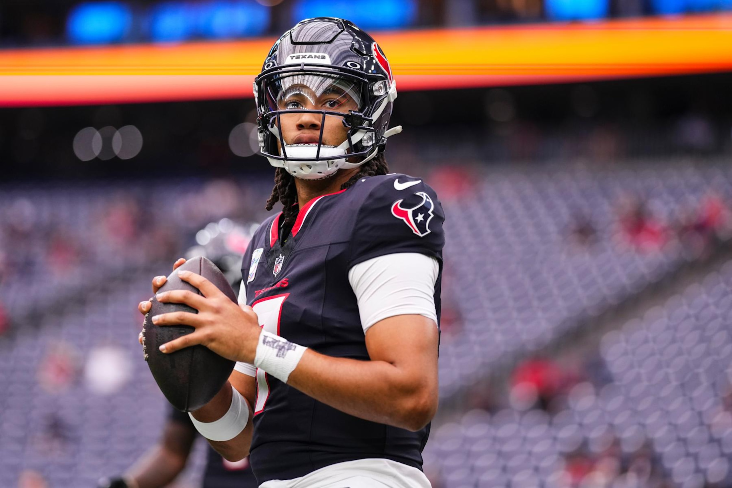HOUSTON, TX - SEPTEMBER 29: C.J. Stroud #7 of the Houston Texans warms up prior to an NFL football game against the Jacksonville Jaguars at NRG Stadium on September 29, 2024 in Houston, Texas. (Photo by Cooper Neill/Getty Images)