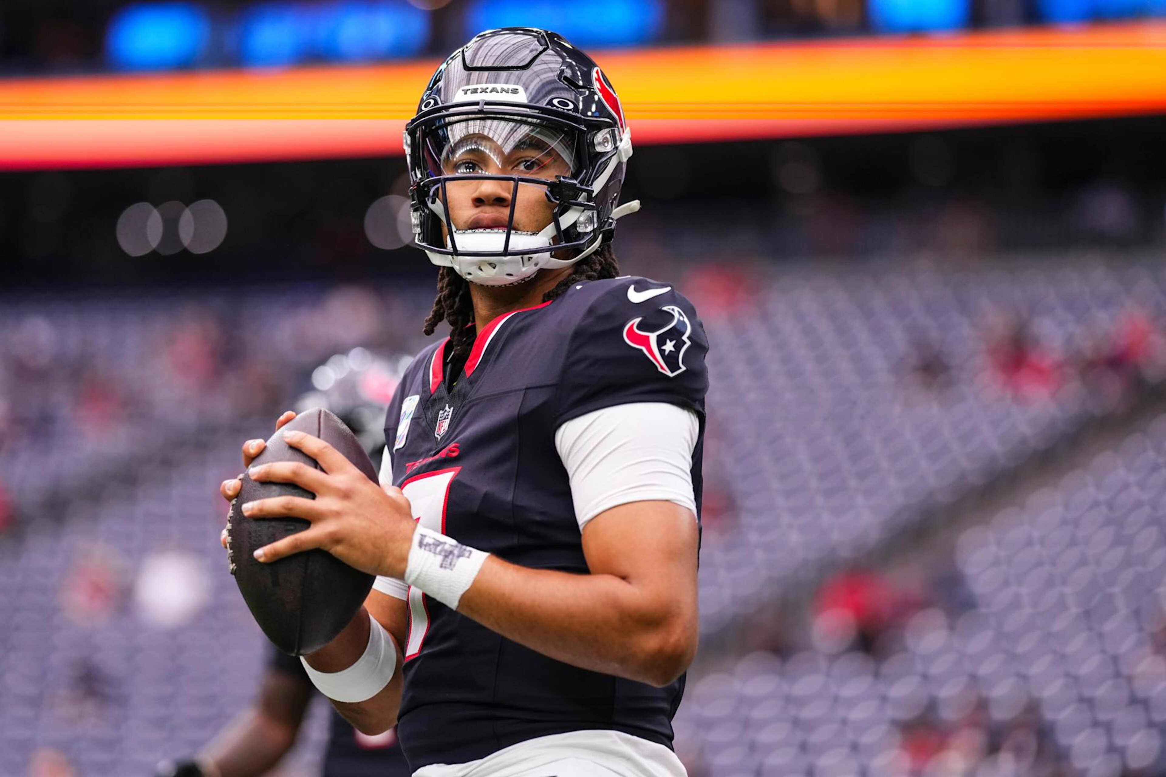 HOUSTON, TX - SEPTEMBER 29: C.J. Stroud #7 of the Houston Texans warms up prior to an NFL football game against the Jacksonville Jaguars at NRG Stadium on September 29, 2024 in Houston, Texas. (Photo by Cooper Neill/Getty Images)