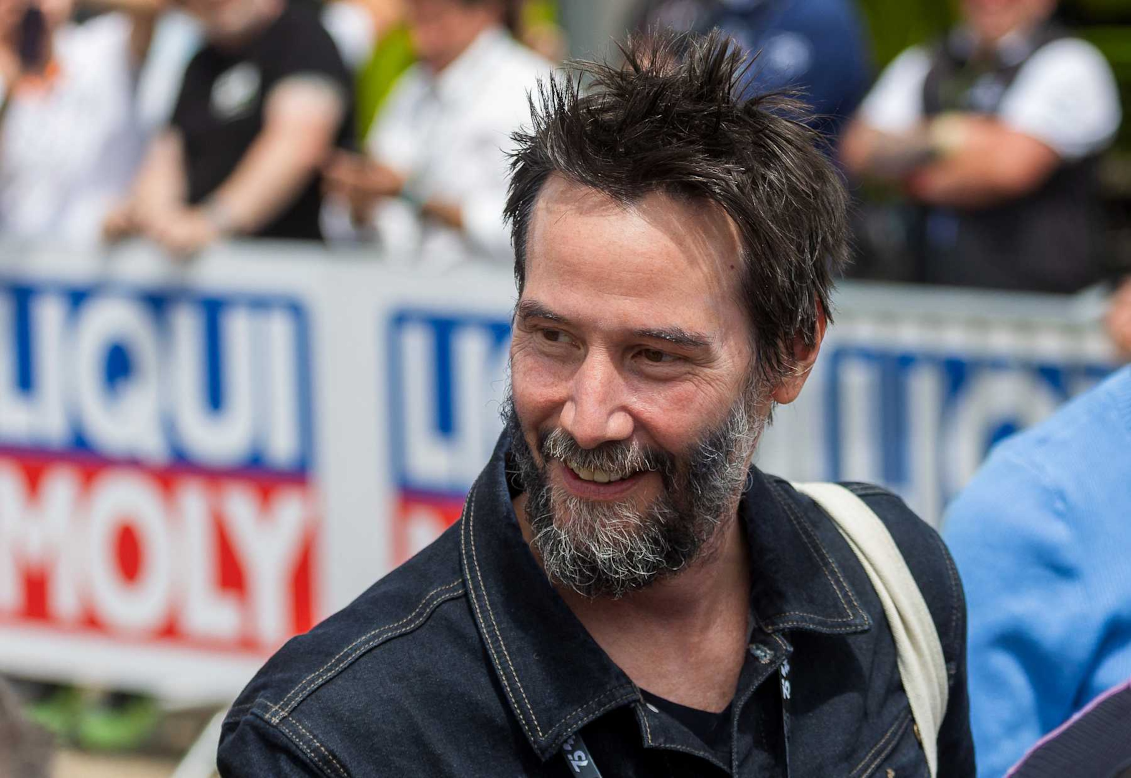 Canadian actor Keanu Reeves attends the German Motorcycle Grand Prix at the Sachsenring racetrack in Hohenstein-Ernstthal, eastern Germany, on July 7, 2024. (Photo by Radek Mica / AFP) (Photo by RADEK MICA/AFP via Getty Images) Canadian actor Keanu Reeves attends the German Motorcycle Grand Prix at the Sachsenring racetrack in Hohenstein-Ernstthal, eastern Germany, on July 7, 2024. (Photo by Radek Mica / AFP) (Photo by RADEK MICA/AFP via Getty Images)